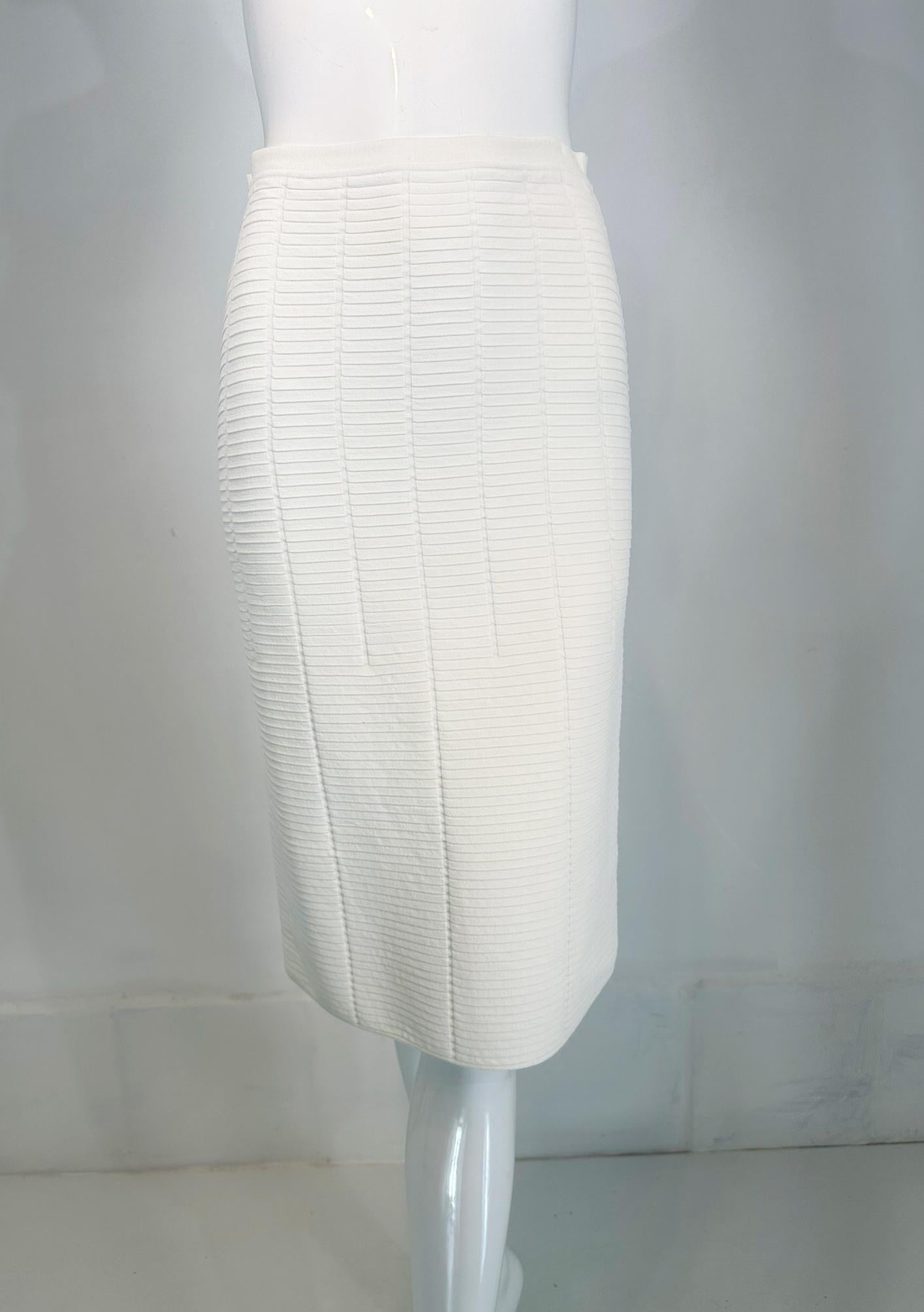 Giorgio Armani white body con ribbed stretch pencil skirt from the 1990s. Pull on skirt, marked size 40. Great layering skirt, looks like it was barely, if ever worn. 
In excellent wearable condition.  All our clothing is dry cleaned and inspected