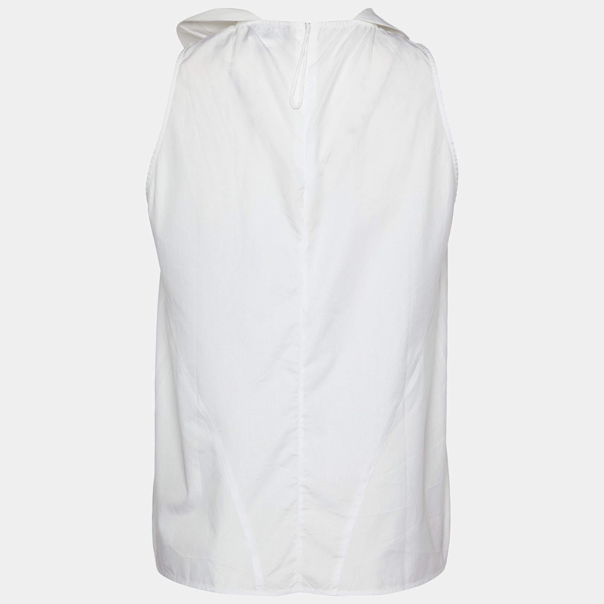 Un'accurata sartoria  materiali di qualità  Il design classico e i tagli eleganti rendono questo top di design un pezzo da conservare.
