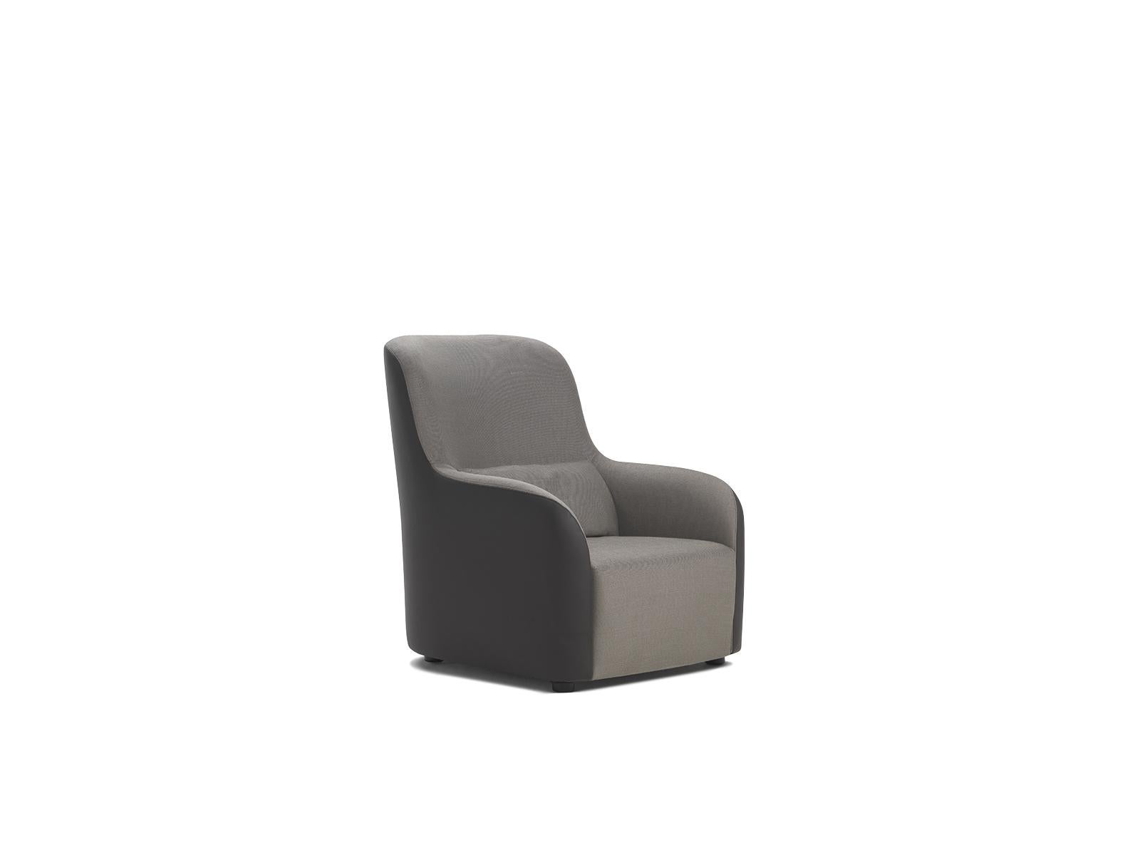 A simple and sophisticated design, an upholstered seating set suitable for living rooms and large bedrooms. Contrast finishing of leather and fabric brings unique elegance to the soft silhouette.