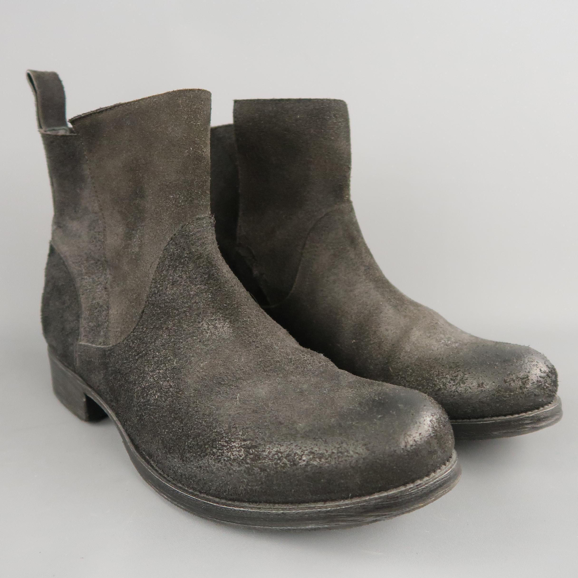 GIORGIO BRATO ankle boots come in black distressed textured suede with a rounded toe, textured, heeled, sole, and deconstructed overlap panel shaft. Stitching coming undone on left boot. as-is. Made in Italy.
 
Good Pre-Owned Condition.
Marked: IT
