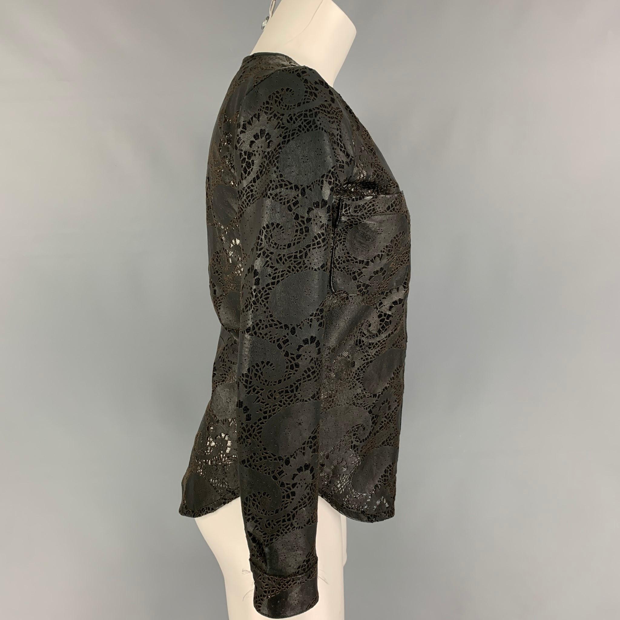 GIORGIO BRATO jacket comes in a black lace perforated leather featuring a collarless style, front pockets, and a zip up closure. 

Very Good Pre-Owned Condition.
Marked: 40

Measurements:

Shoulder: 14 in.
Bust: 34 in.
Sleeve: 23 in.
Length: 23.5