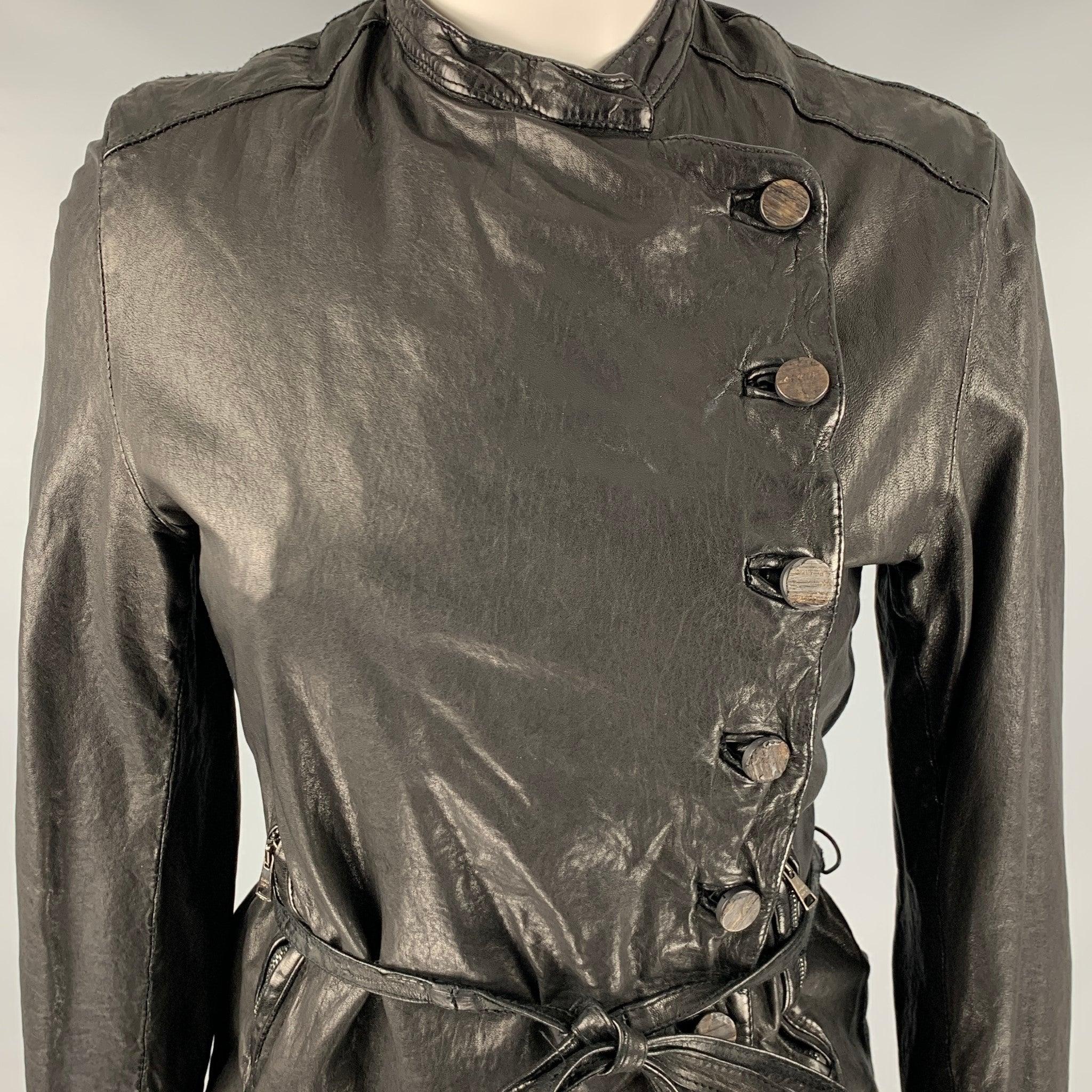 GIORGIO BRATO jacket
in a black leather fabric featuring vegetable tan, belted style, and an asymmetrical button closure. Made in Italy.Very Good Pre-Owned Condition. Moderate signs of wear. 

Marked:   IT 40 

Measurements: 
 
Shoulder: 15 inches 