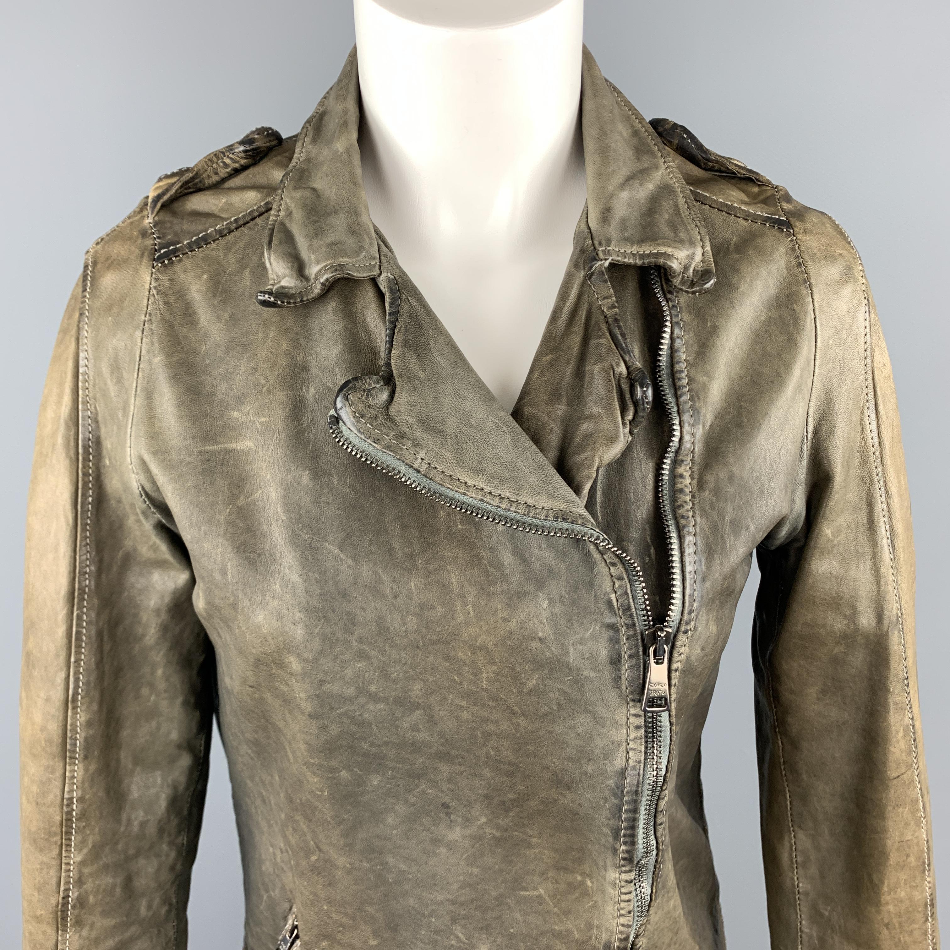 GIORGIO BRATO biker jacket comes in distressed vegetable tanned leather with a double breasted zip front, epaulets, and pointed collar. Hand Made in Italy.

Excellent Pre-Owned Condition.
Marked: IT 40
Original Retail Price: