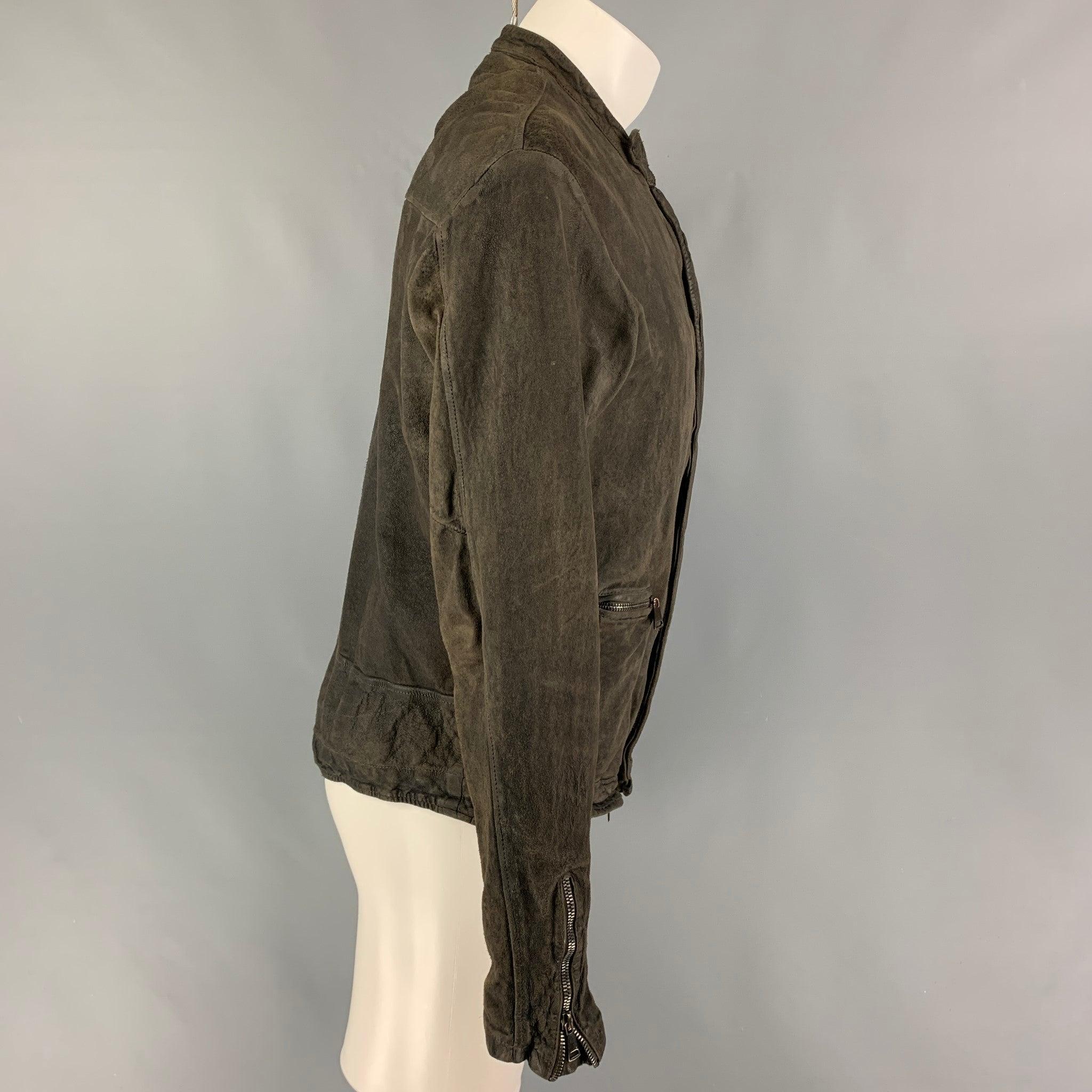 GIORGIO BRATO jacket comes in a charcoal distressed vegetable tanned leather featuring front zipper pockets, strap collar, zipped cuffs, and a full zip up closure. Made in Italy.
Very Good
Pre-Owned Condition. 

Marked:   50 

Measurements: 
