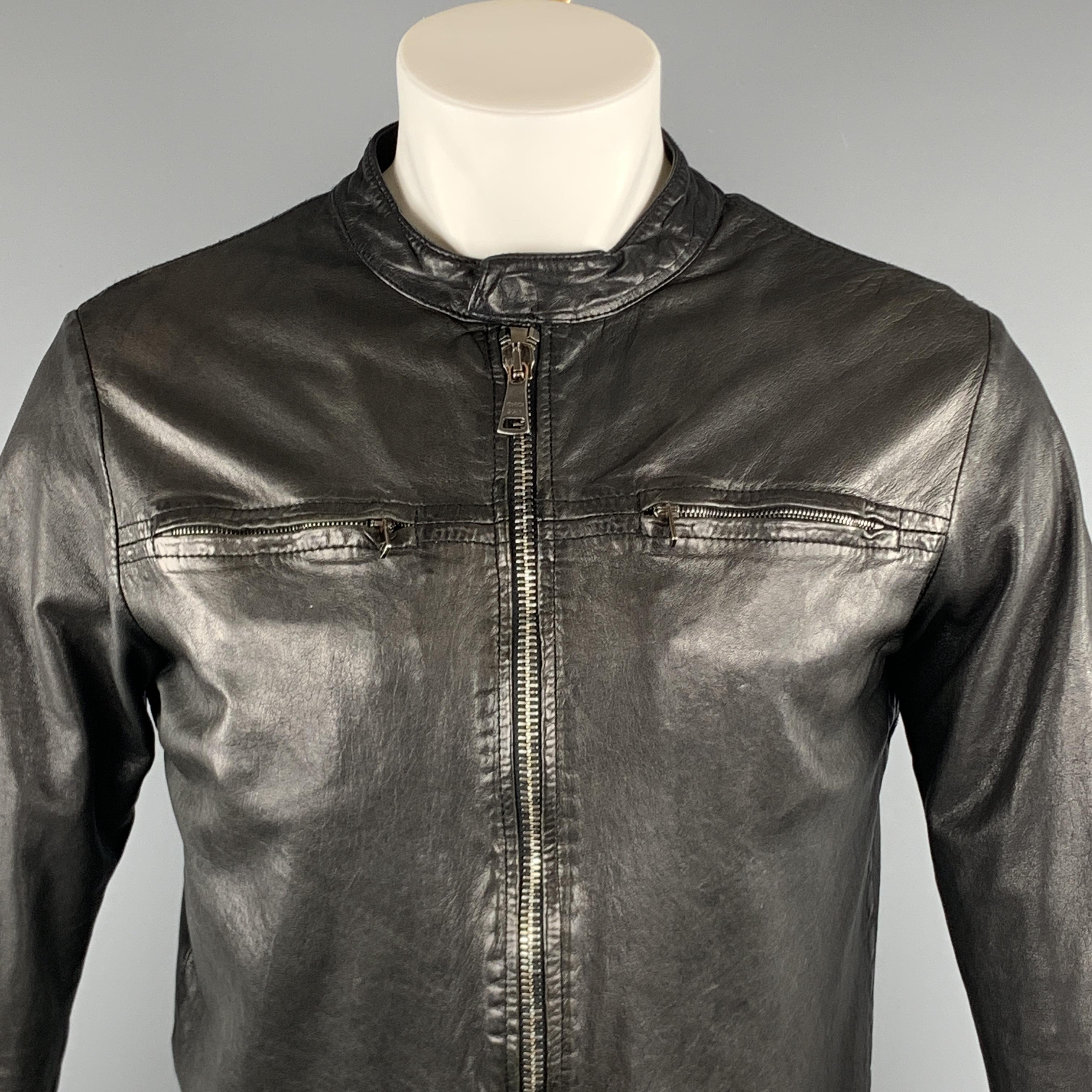 GIORGIO BRATO Jacket comes in a black leather featuring a full zip closure, side zipper sleeves, and front zipper pockets. Made in Italy.
 

Very Good Pre-Owned Condition.
Marked: 48

Measurements:

Shoulder: 18 in.
Chest: 38 in. 
Sleeve: 27 in.