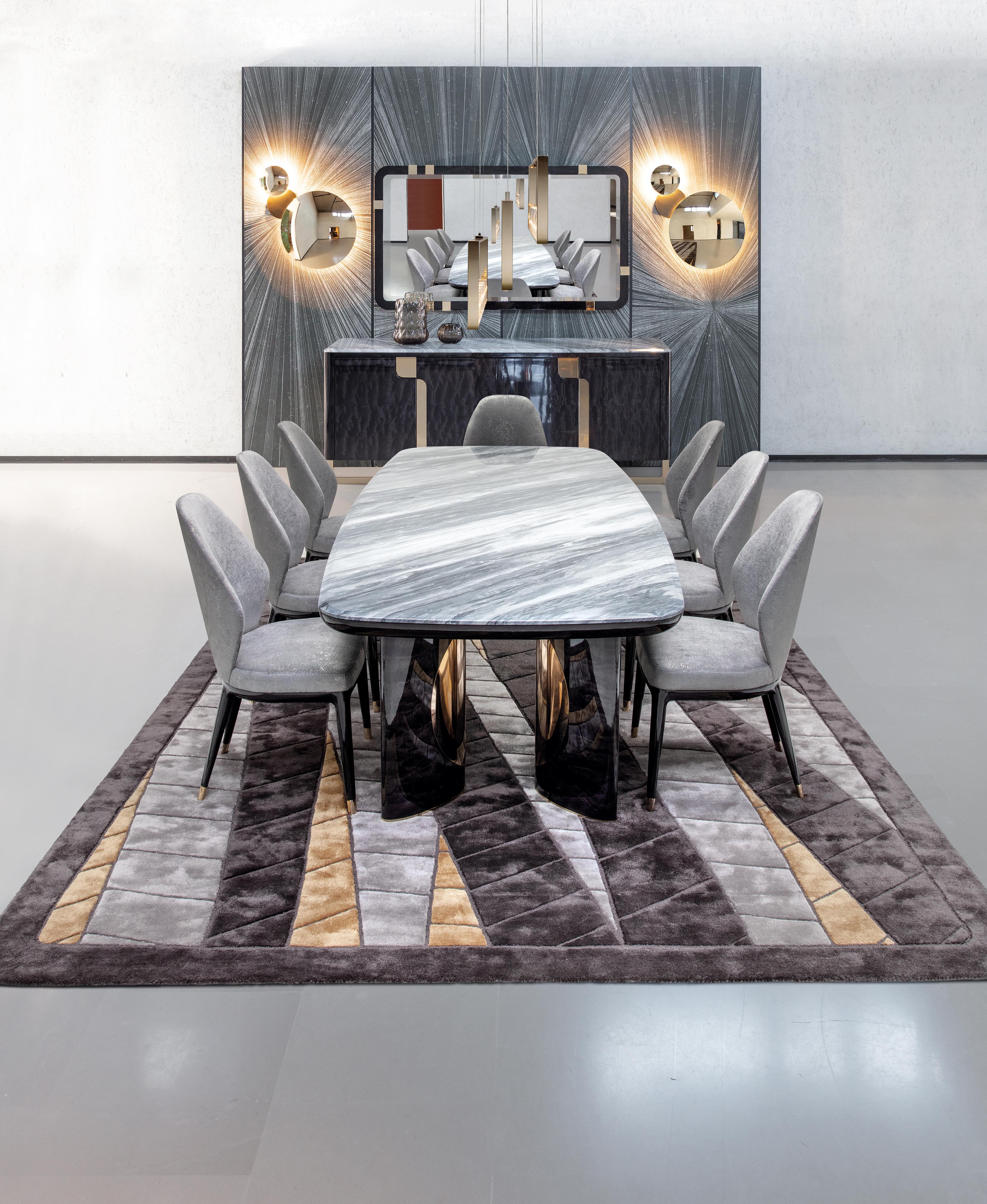 The Giorgio Collection Charisma Italian rectangular table is a stunning piece that combines luxury and elegance. Featuring a grey Alpi marble top, it offers a sophisticated surface that’s both durable and visually striking. The base, crafted from