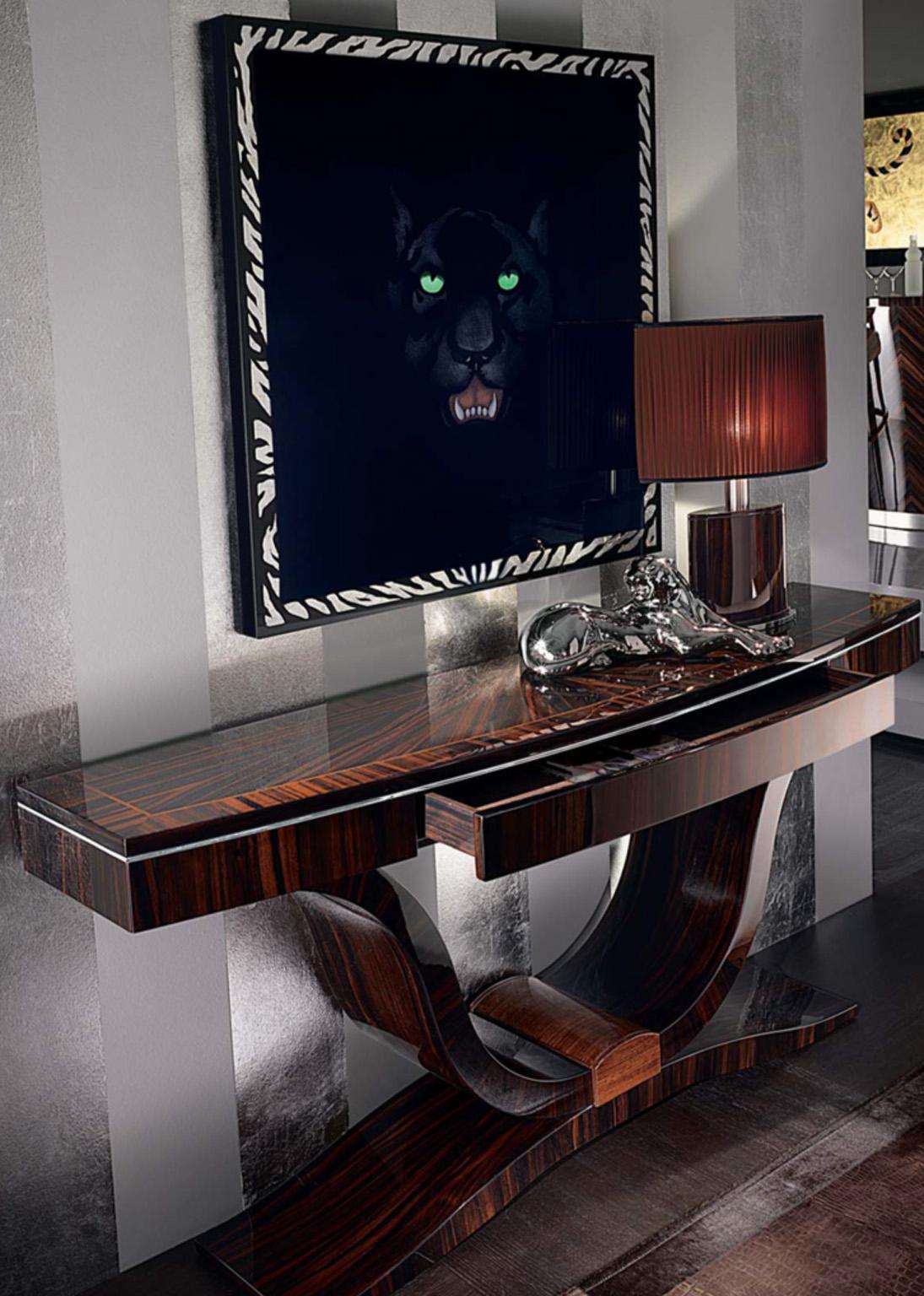 Art Deco style console with top in sunburst ebony Macassar wood with 6mm filet
in Zebra veneer in high gloss polyester. 1 full extension ebony center drawer with bottom velvet and ebony Macassar wood inside. Ebony Makassar wood curved legs with