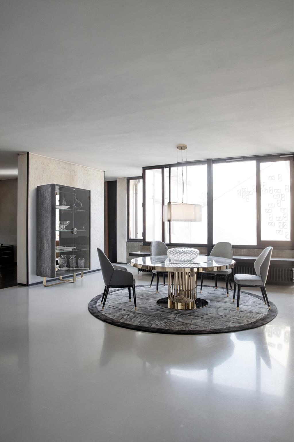 Round table in light gold chrome stainless steel with marble top.
Lazy susan inserted of diam. cm 100 in marble grey Alpi.
Giorgio Collection logo on the metal base.
Size: diam. cm 180 x 76 H
Size: diam. 71’’ x 30’’H.