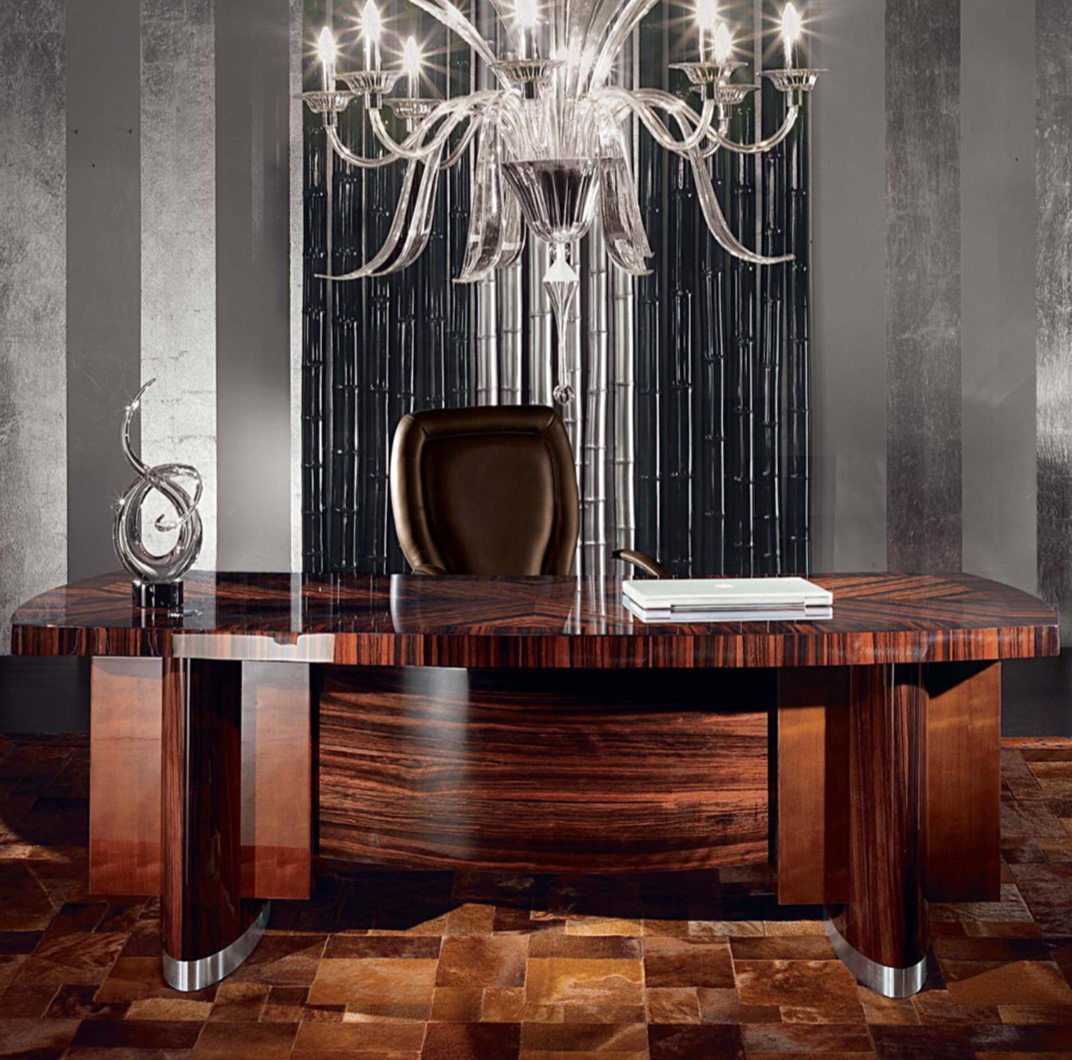 Indulge in the epitome of luxury with this exquisite desk. Its ebony Macassar top, adorned with a Zebra veneer filet in high gloss polyester, exudes opulence. Velvet-lined drawers offer plush storage, while brushed stainless steel feet add a modern