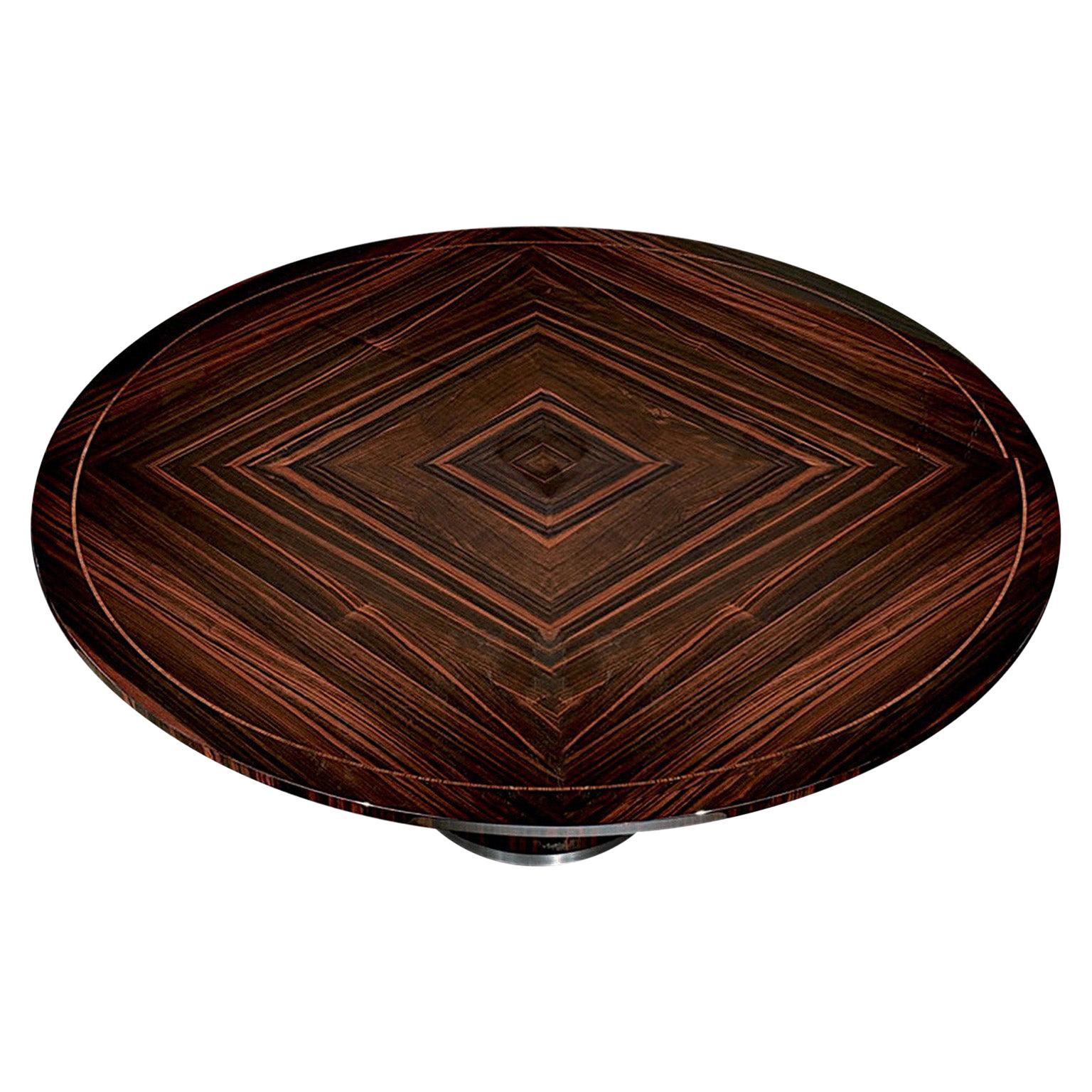 Round dining table with inlay top in ebony Makassar with 6mm filet in Zebra veneer in
high gloss polyester. Brushed and chrome stainless steel details on the table’s legs.


Size: diameter cm 122 x 75 height
Size: diameter 48” x 29”½ height.

This