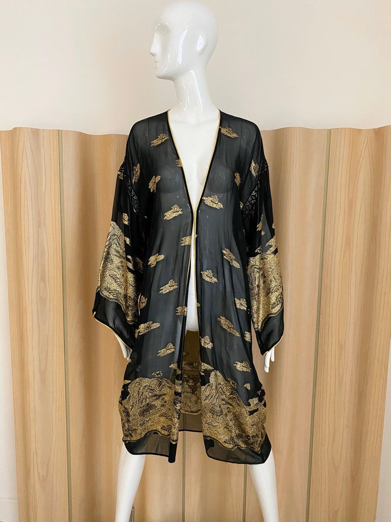 70s Giorgio di sant Angelo black and gold crepe robe jacket/duster.
Jacket has no button.
Fit size 4/6/8 ( small to medium)