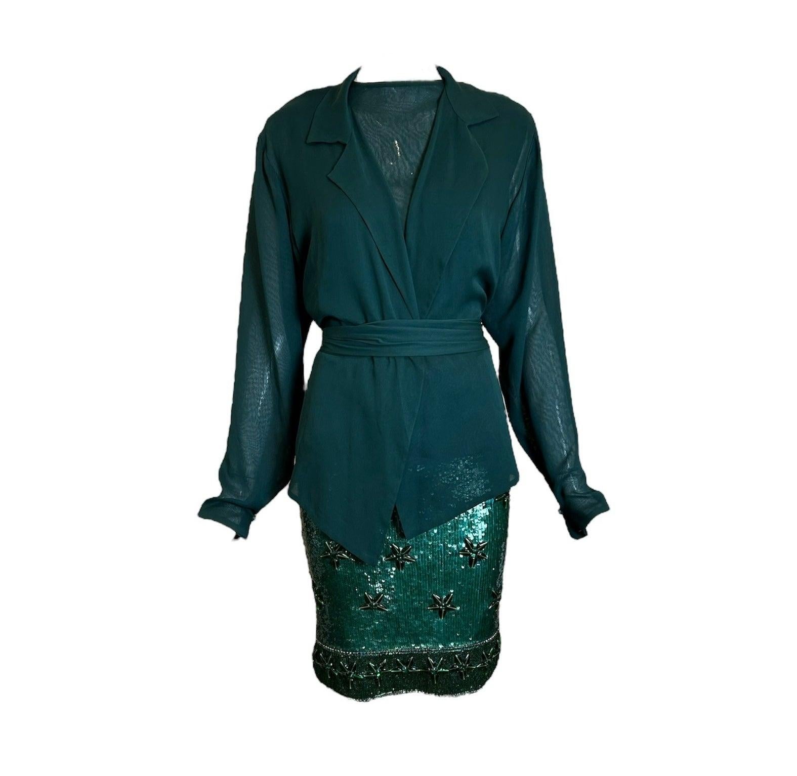 A perfect example of 80s excess and glamour! Of course only the 80s could incorporate a heavily beaded skirt with the hyper-delicate accents of chiffon to create that bold and soft paradox! This four piece ensemble is unique in that each piece can