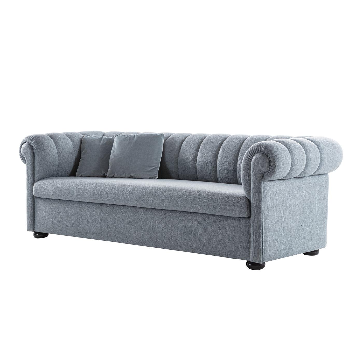This sofa bed exemplifies its personal interpretation key of classic furniture. The solid walnut frame is generously padded with multi-density polyurethane foam and upholstered in soft gray fabric, the backrest enlivened by an exquisite quilted