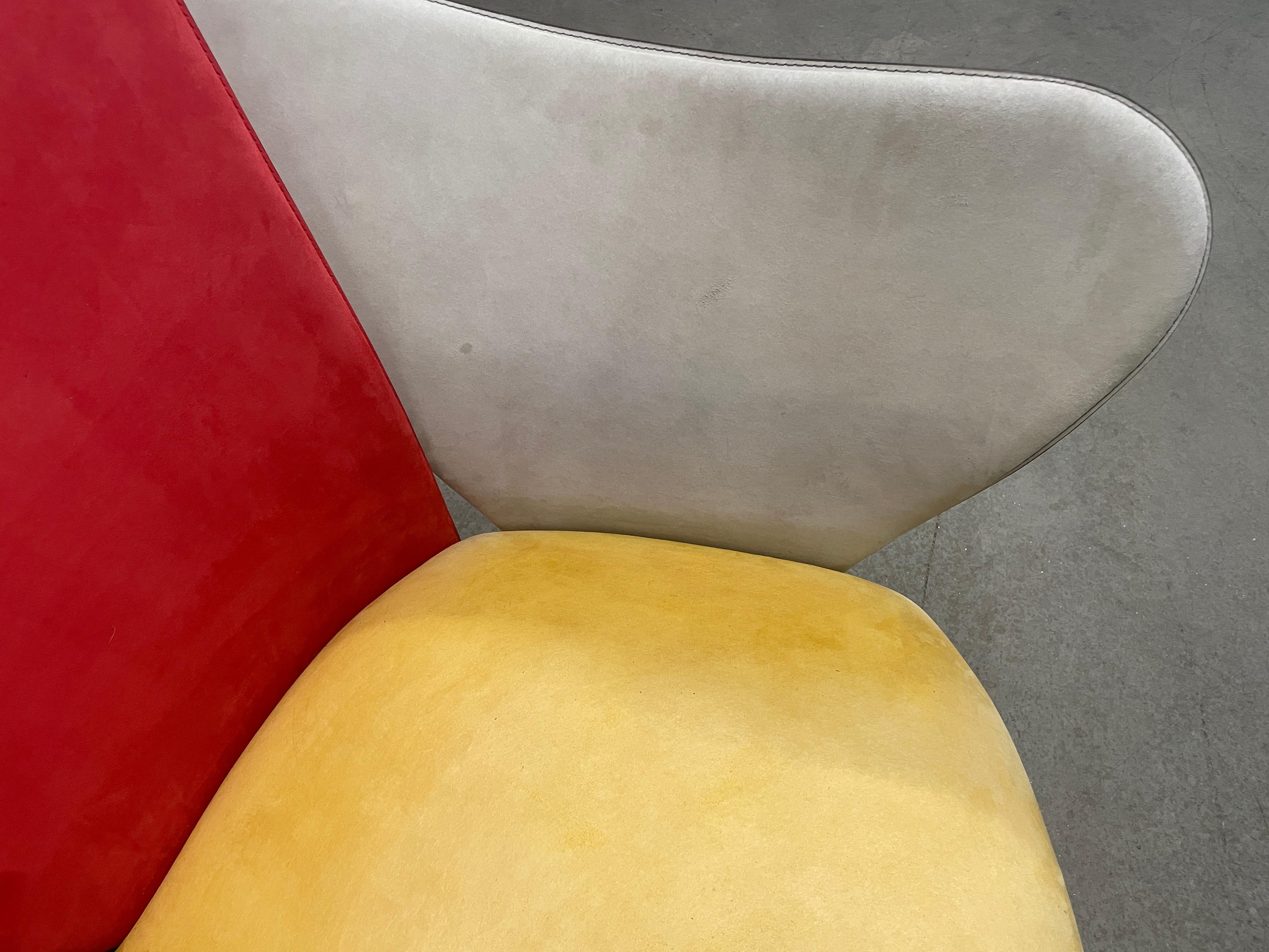 Post-Modern Flower Chair in primary color scheme, designed by Giorgio Saporiti. Made by Il Loft of Italy, circa 1990. Each Saporiti Flower chair is completely unique. The chair's organic 'petals' are made of hand-formed steel shapes. Each piece is