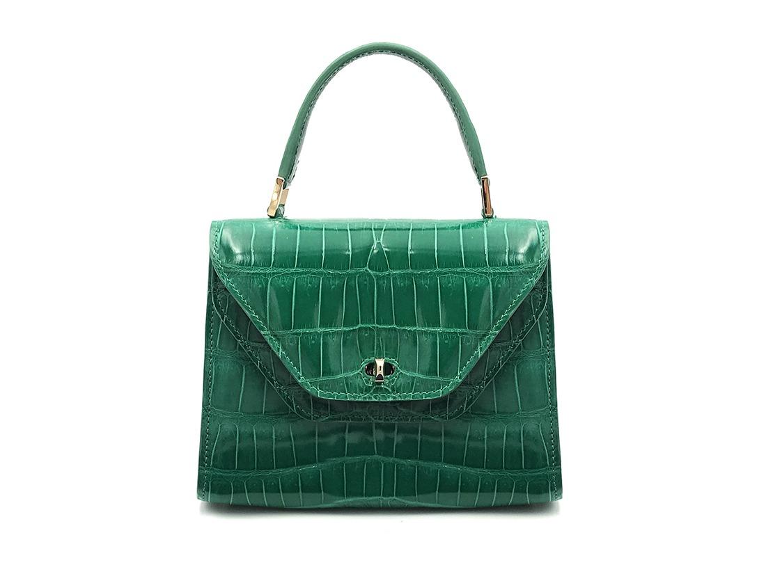green crocodile purse