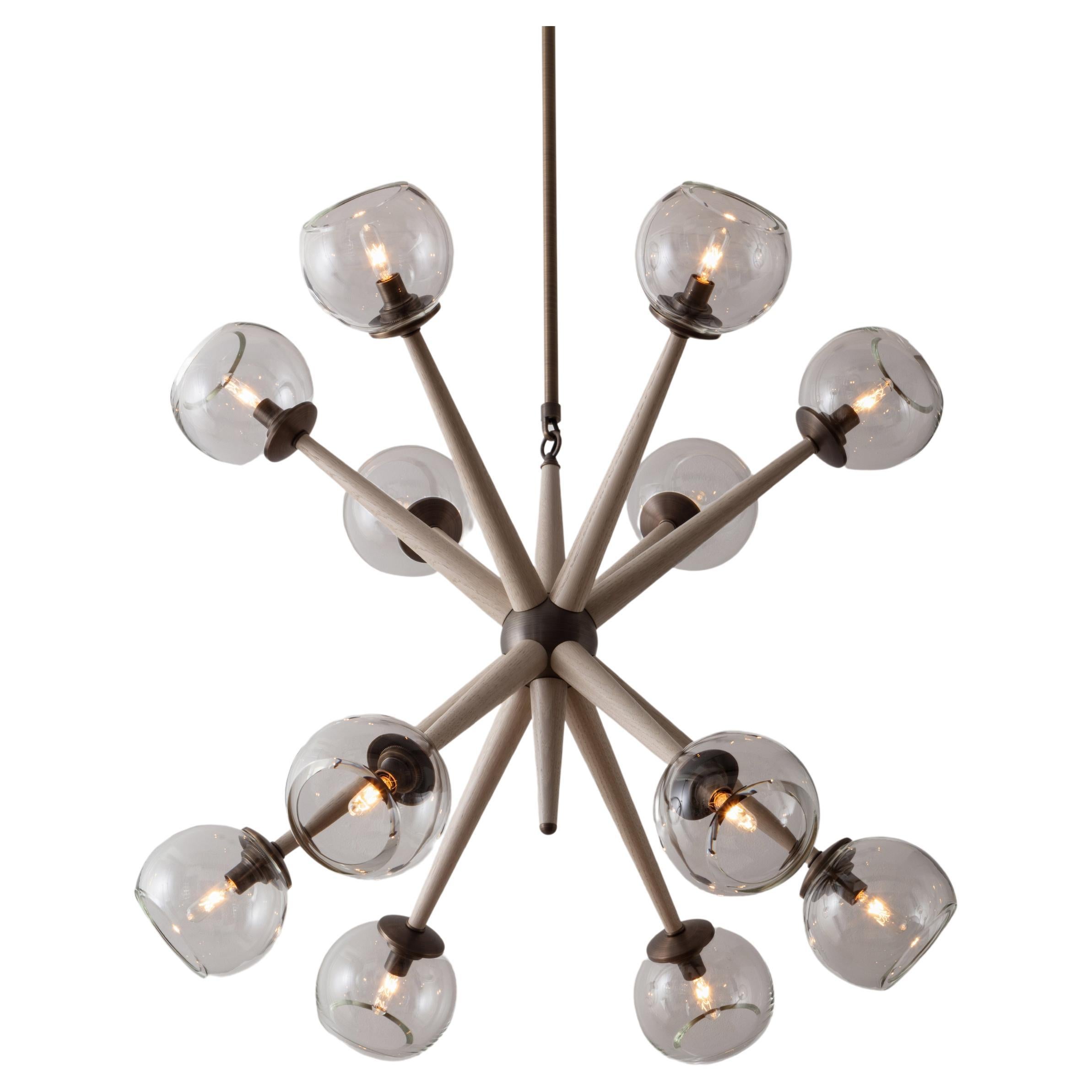Giotto Burst (6.6) Chandelier in Oak and Brass Finishes By Matthew Fairbank For Sale