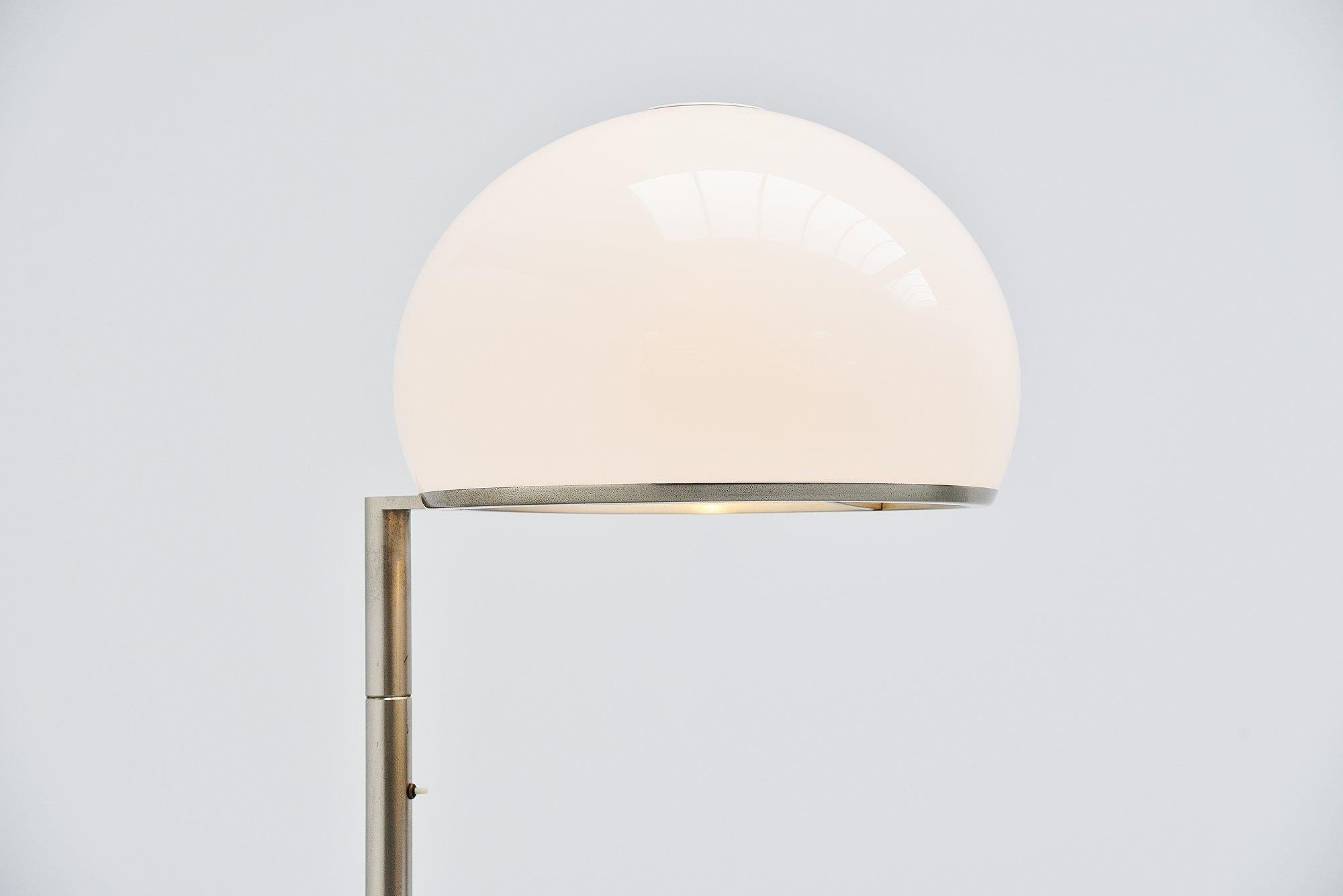 Rare floor lamp model 2051 designed by Vittorio Gregotti, Lodovico Meneghetti and Giotto Stoppino and manufactured by Arteluce, Italy 1966. This is a very nice and large floor lamp. The lamp has a nickel plated metal stem and a plexiglass white