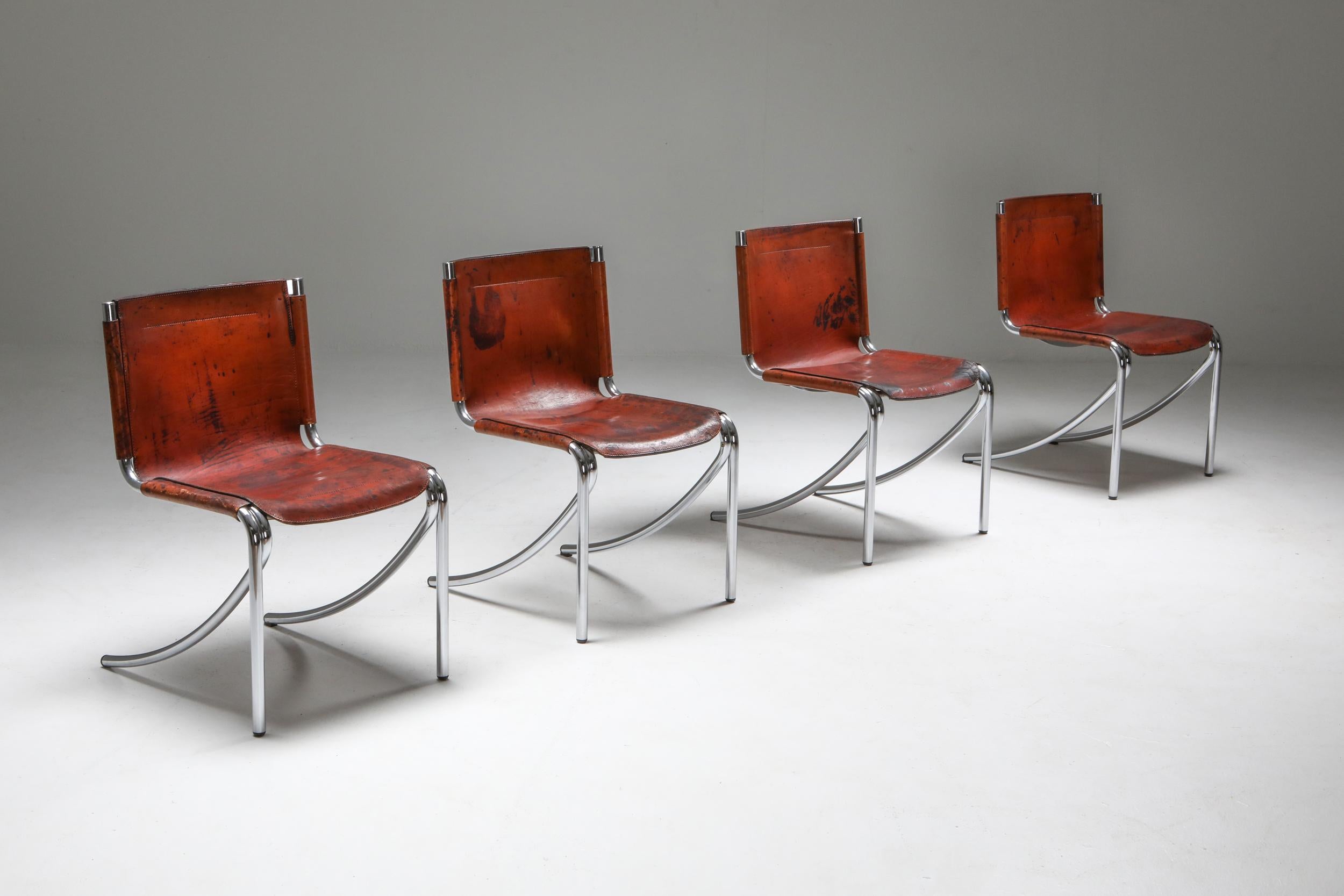 Acerbis, model 'Jot', by Giotto Stoppino, Italy, 1970s

Stunning patina on the leather adds tons of character on these oxblood leather chairs.
The chrome frame is also still in really good condition.
 