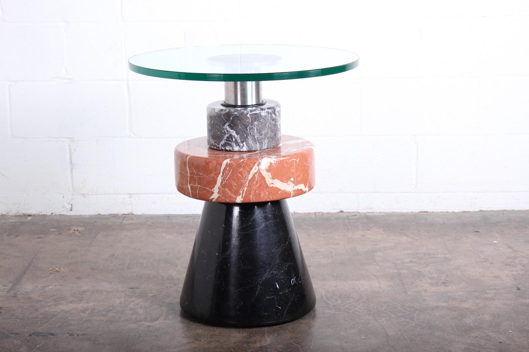 A marble, glass and stainless Menhir table by Giotto Stoppino for Acerbis International, 1983.