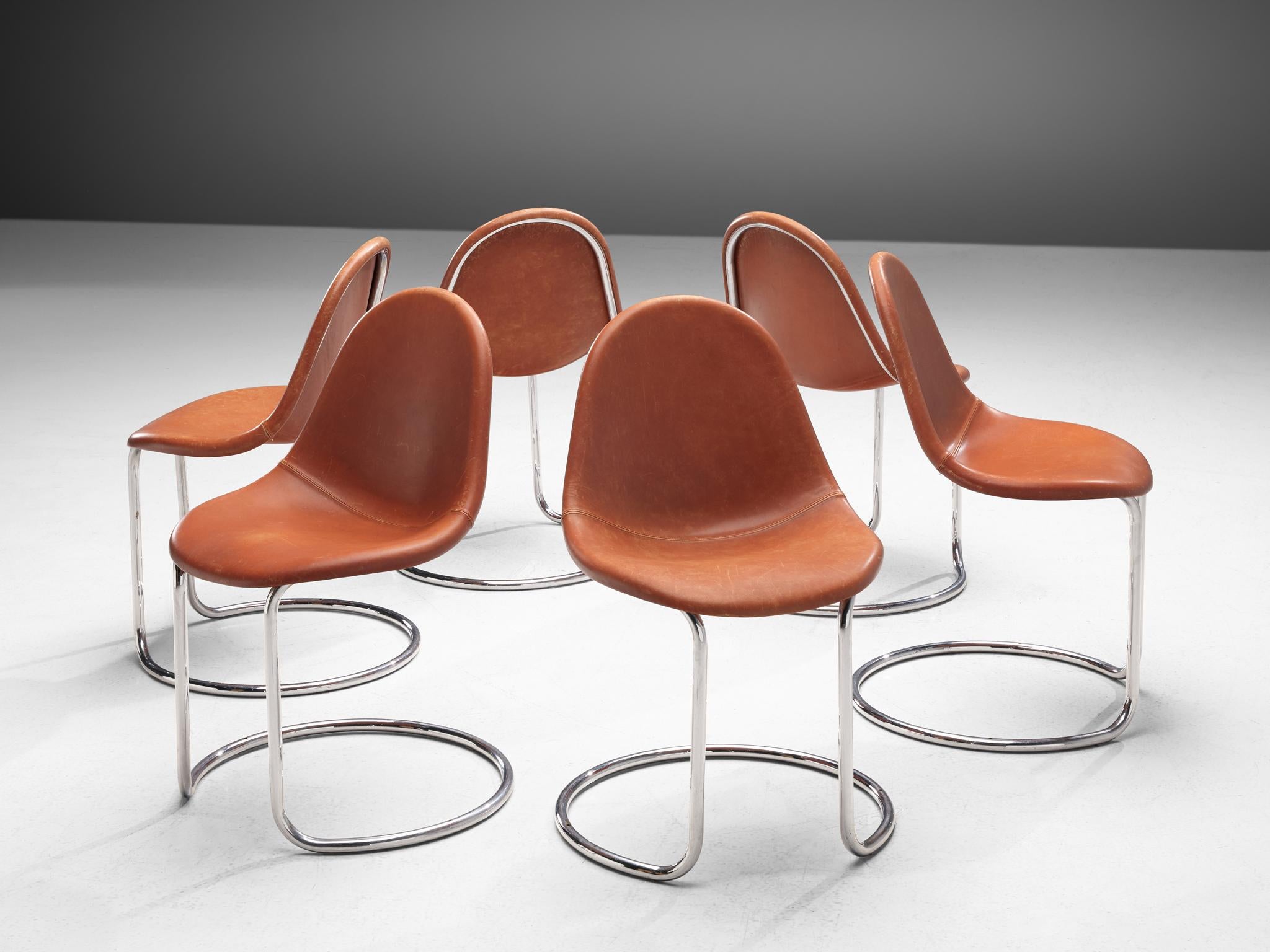 Giotto Stoppino for Bernini, set of six 'Maya' chairs, leather and chromed steel, Italy, 1969.

A set of six cognac leather 'Maya' chairs by Giotto Stoppino, manufactured by Bernini. The chairs feature a moulded shell covered with leather. The