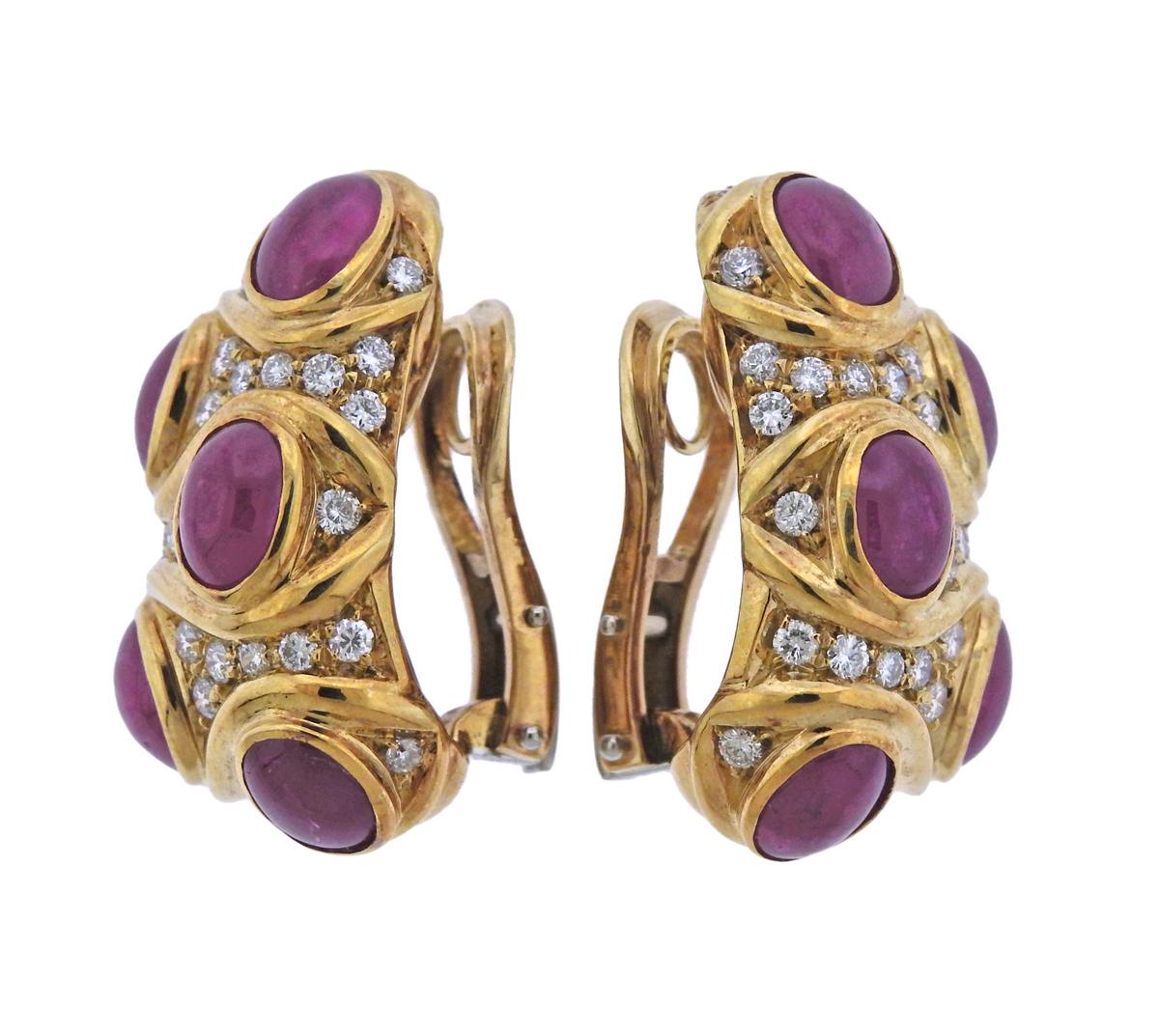 Pair of 18k gold earrings, designed by Italian jewelry maker Giovane, decorated with ruby cabochons and approx. 1.40ctw in G/VS diamonds. Earrings are 28mm x 15mm and weigh 22.7 grams. Marked Giovane, Italy, 18KT. 