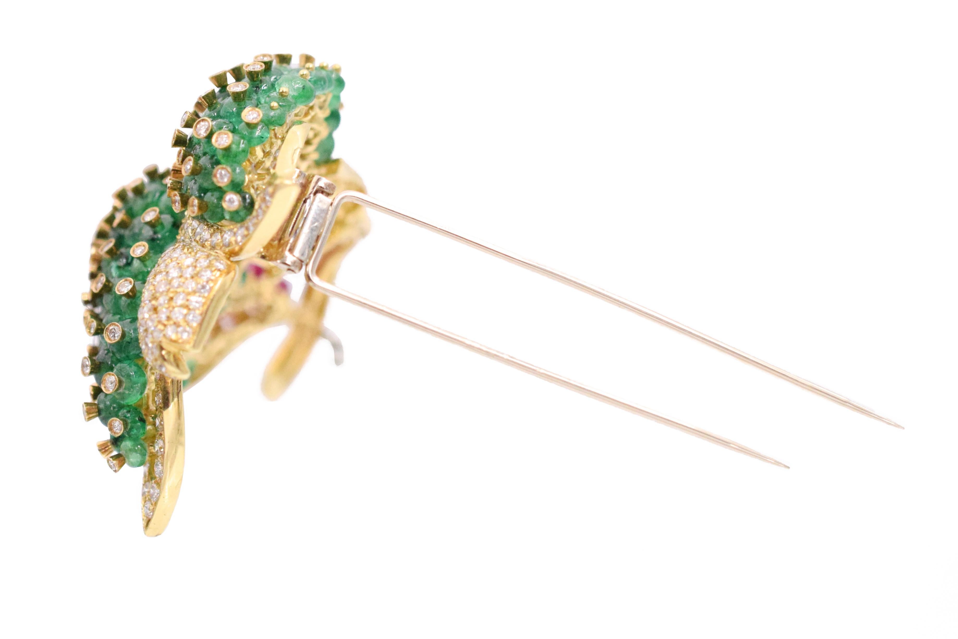 Gemstone, Diamond, and 18k Yellow Gold Flower Pin. This pin has 11ct of diamonds, 3ct of rubies, and 25ct of emeralds all set in 18k yellow gold. Stamped 750, GIOVANI, Italy