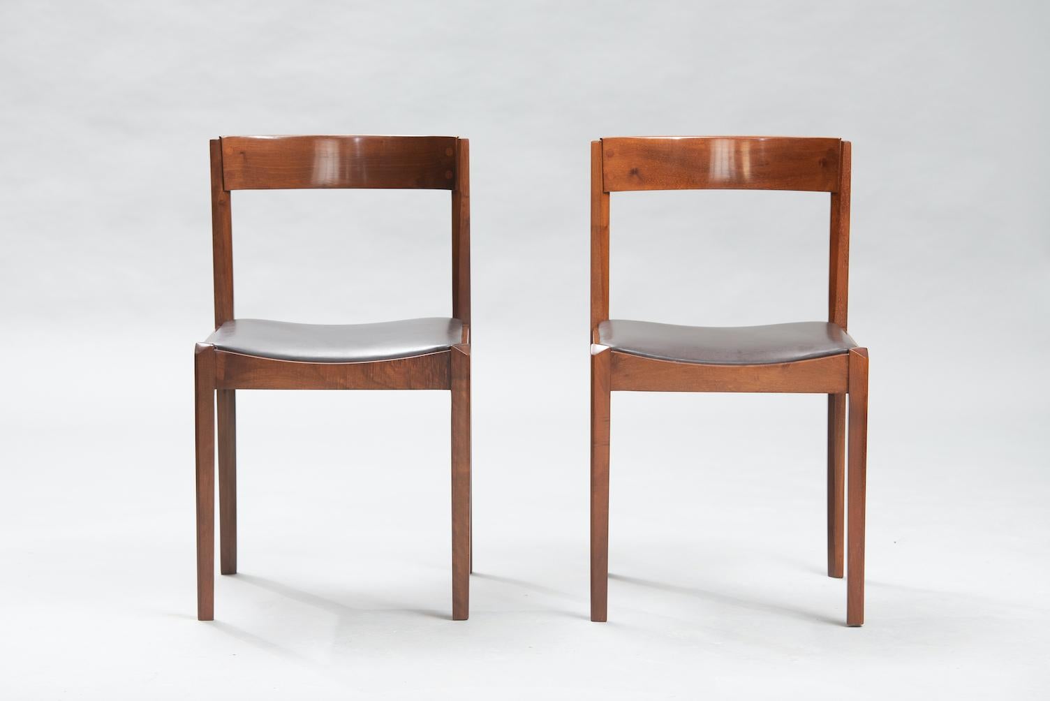 Giovanni Ausenta walnut dining chairs, original upholstery in dark brown faux leather.