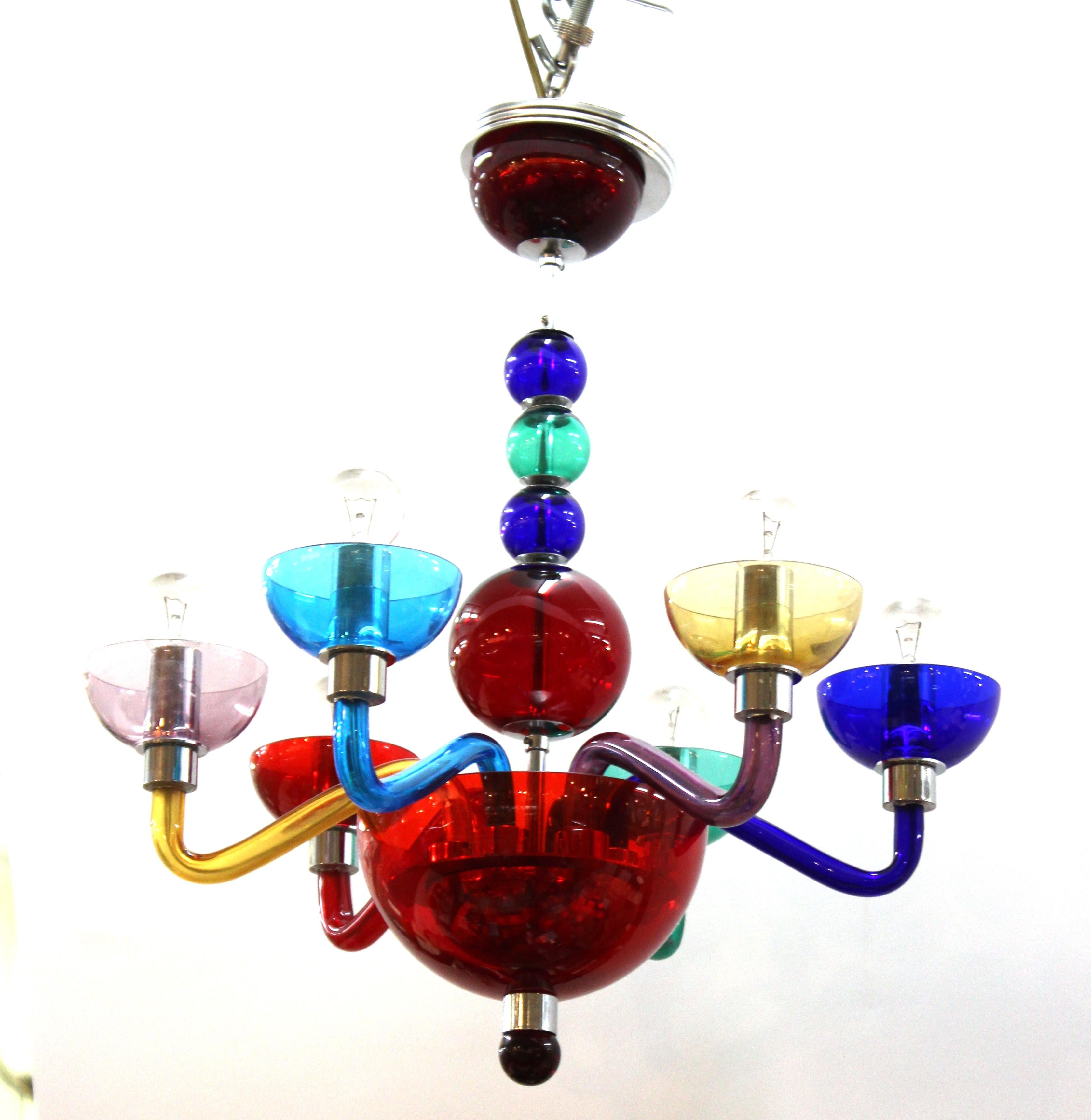 Italian modern multicolored Murano glass chandelier with six arms designed by Giovanni Cenedese, circa 1970s. The piece has its original label on the outer rim of the lower glass cup and an etched signature. Previous repair work on the lower part of