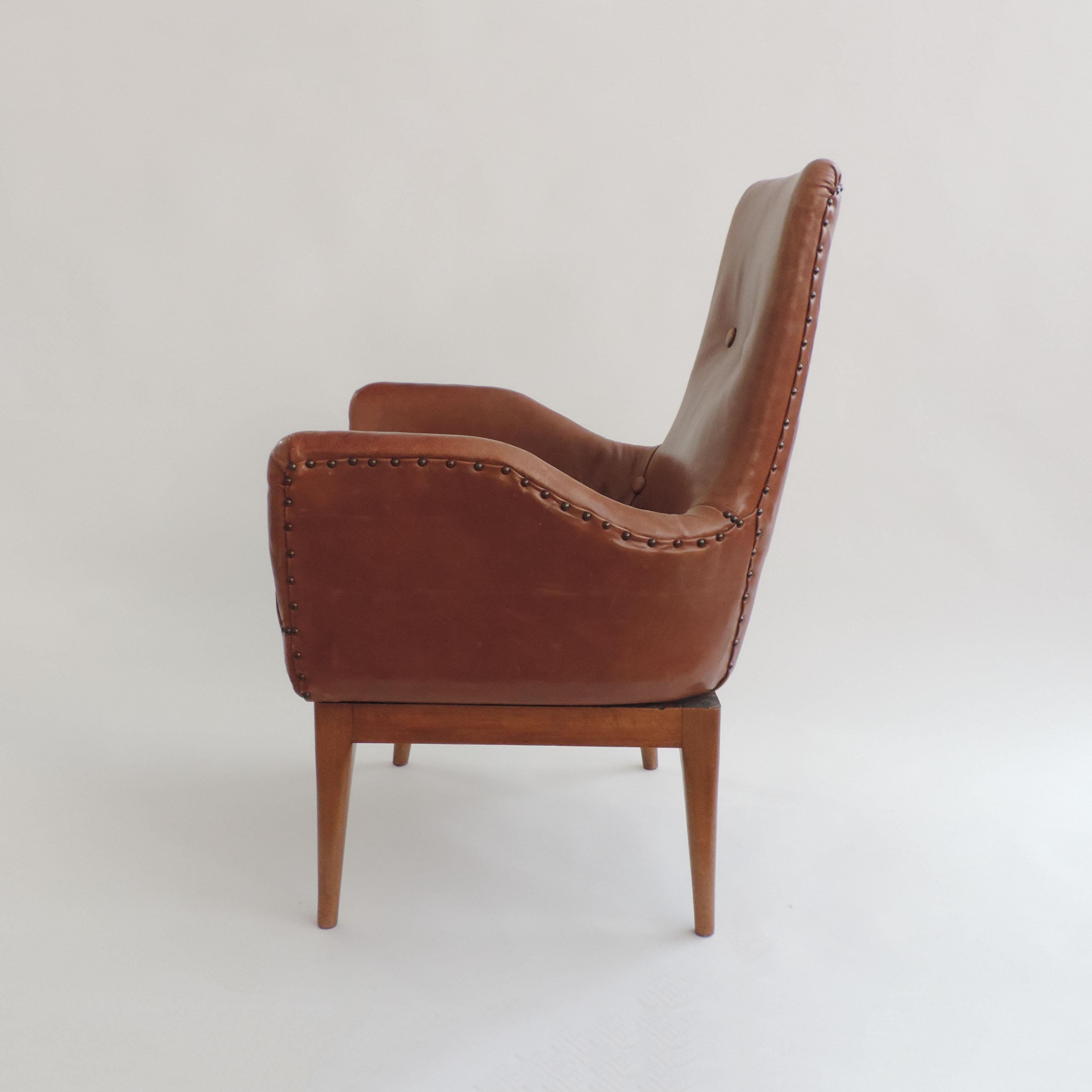 Fauteuil pivotant Giovanni Gariboldi en cuir et bois,
Superbe fauteuil de bureau.