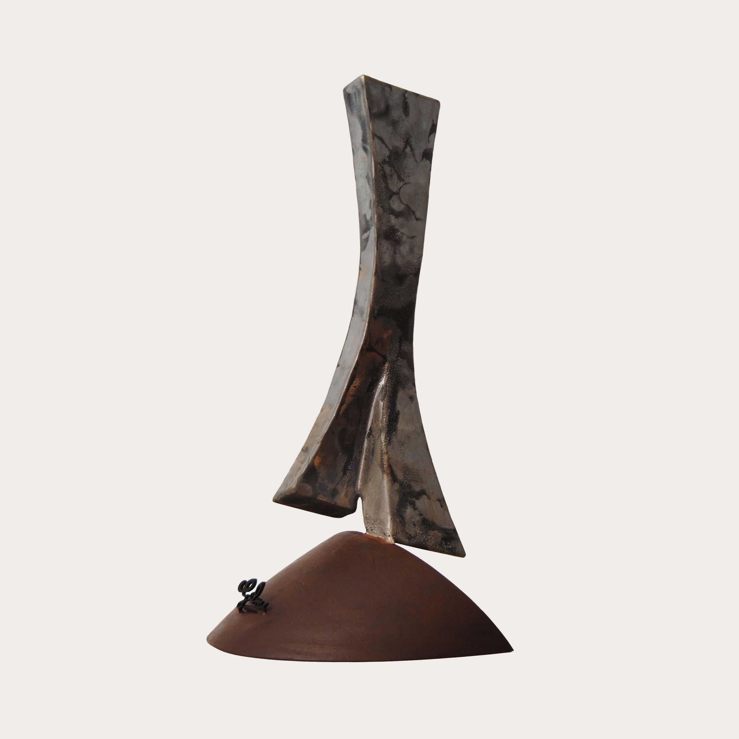 A stunning and dynamic contemporary sculpture crafted from patinated corten steel, perfect for both indoor and outdoor spaces. This exquisite piece is designed to elevate any environment with its timeless beauty and modern aesthetic.

Giovanni