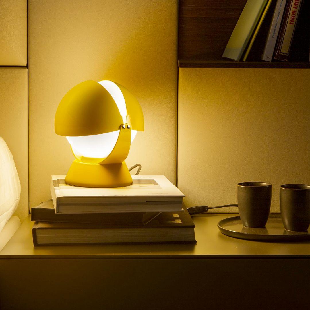 Giovanni Gorgoni 'Buonanotte' metal & acrylic table lamp in yellow for Stilnovo

Founded in 1946 in Milan, Stilnovo was one of the most innovative lighting companies in Italy during the Midcentury era, producing iconic pieces by such luminaries as