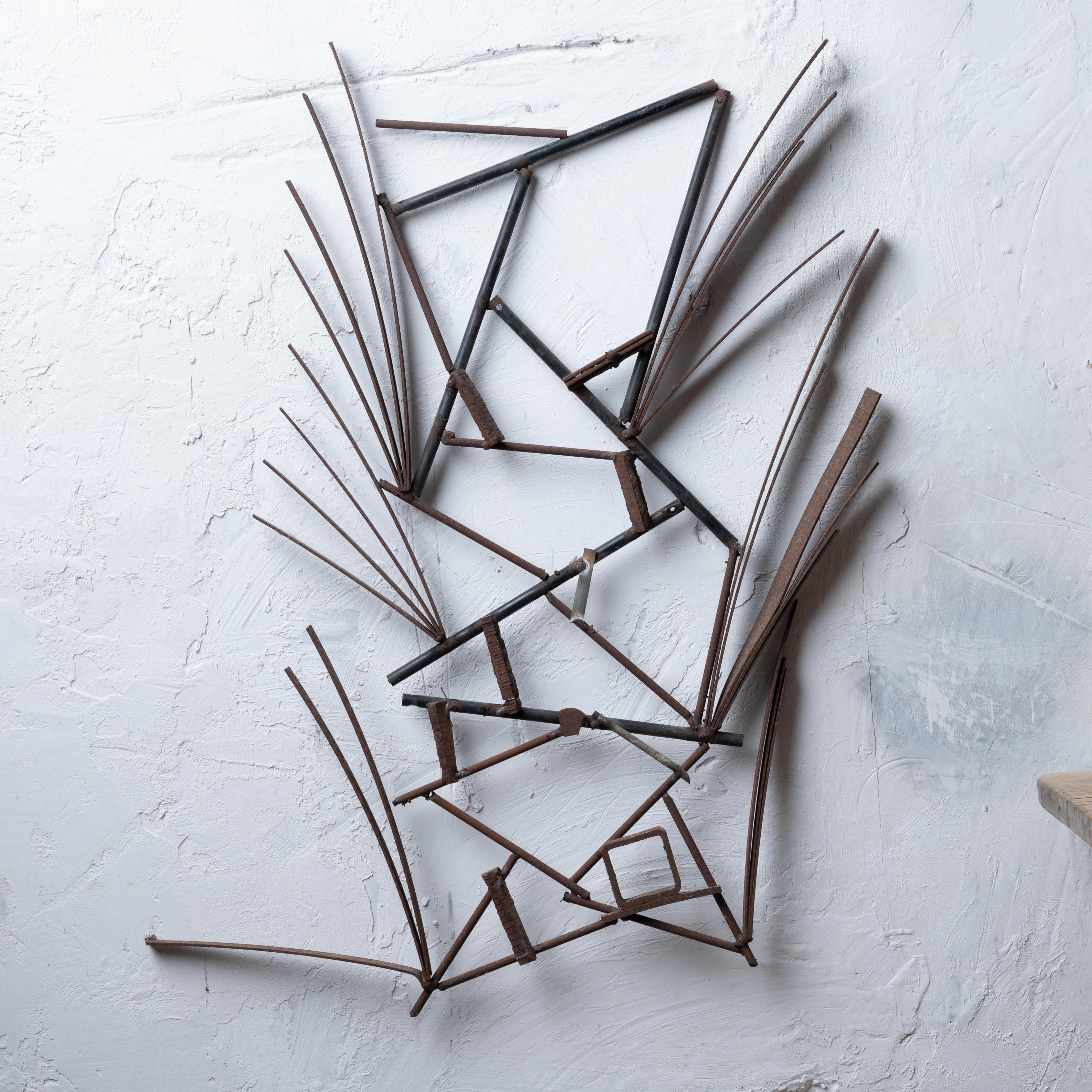 Giovanni 'John' Bucci
(Italian-American, 1935-2019)

A welded metal sculpture composed of various found metal pieces, 1960s.

20 inches wide by 30 ½ inches tall by 1 ½ inches deep



