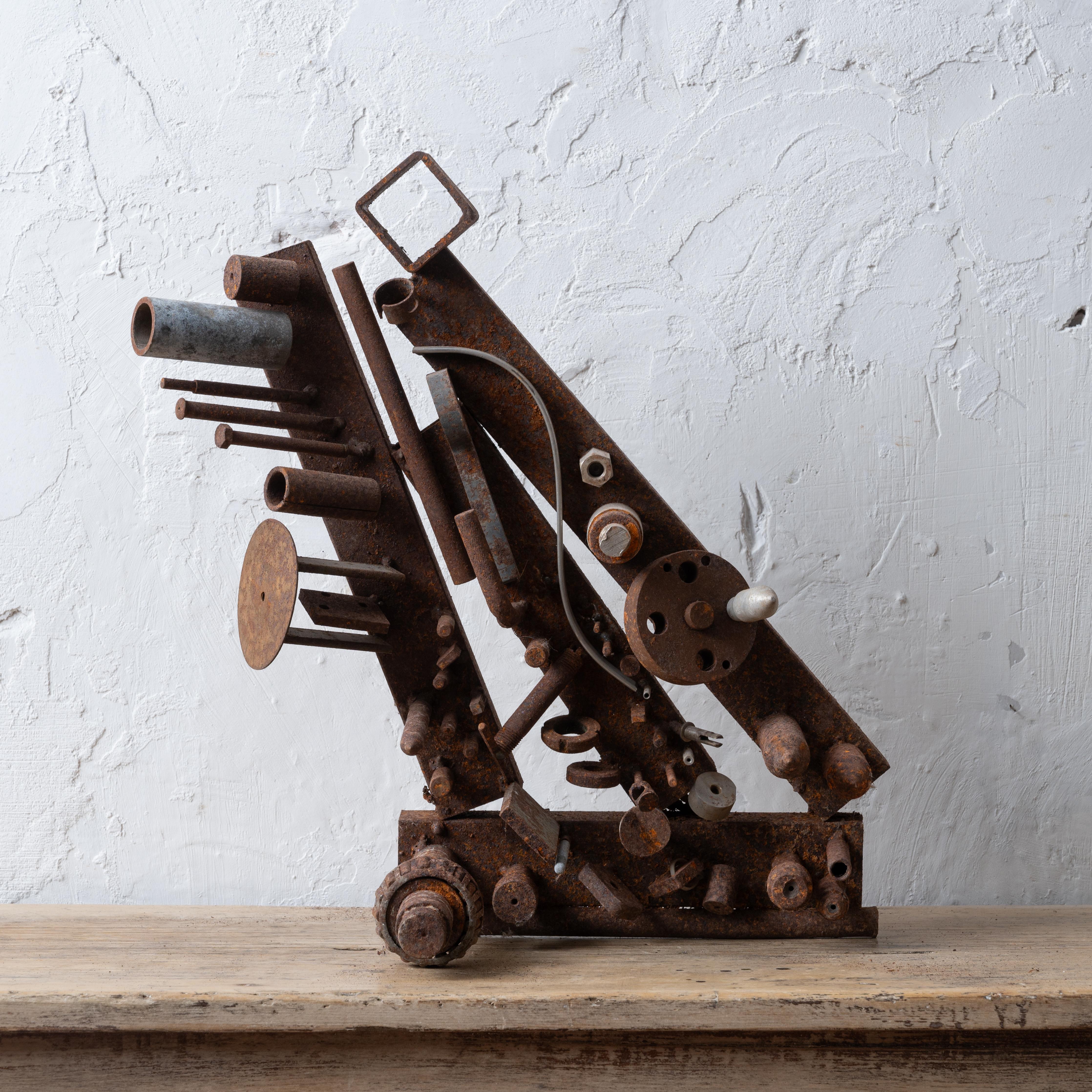 Giovanni 'John' Bucci
(Italian-American, 1935-2019)

A welded metal sculpture composed of various found metal pieces, 1960s.

17 inches wide by 18 ¼ inches tall by 8 inches deep



