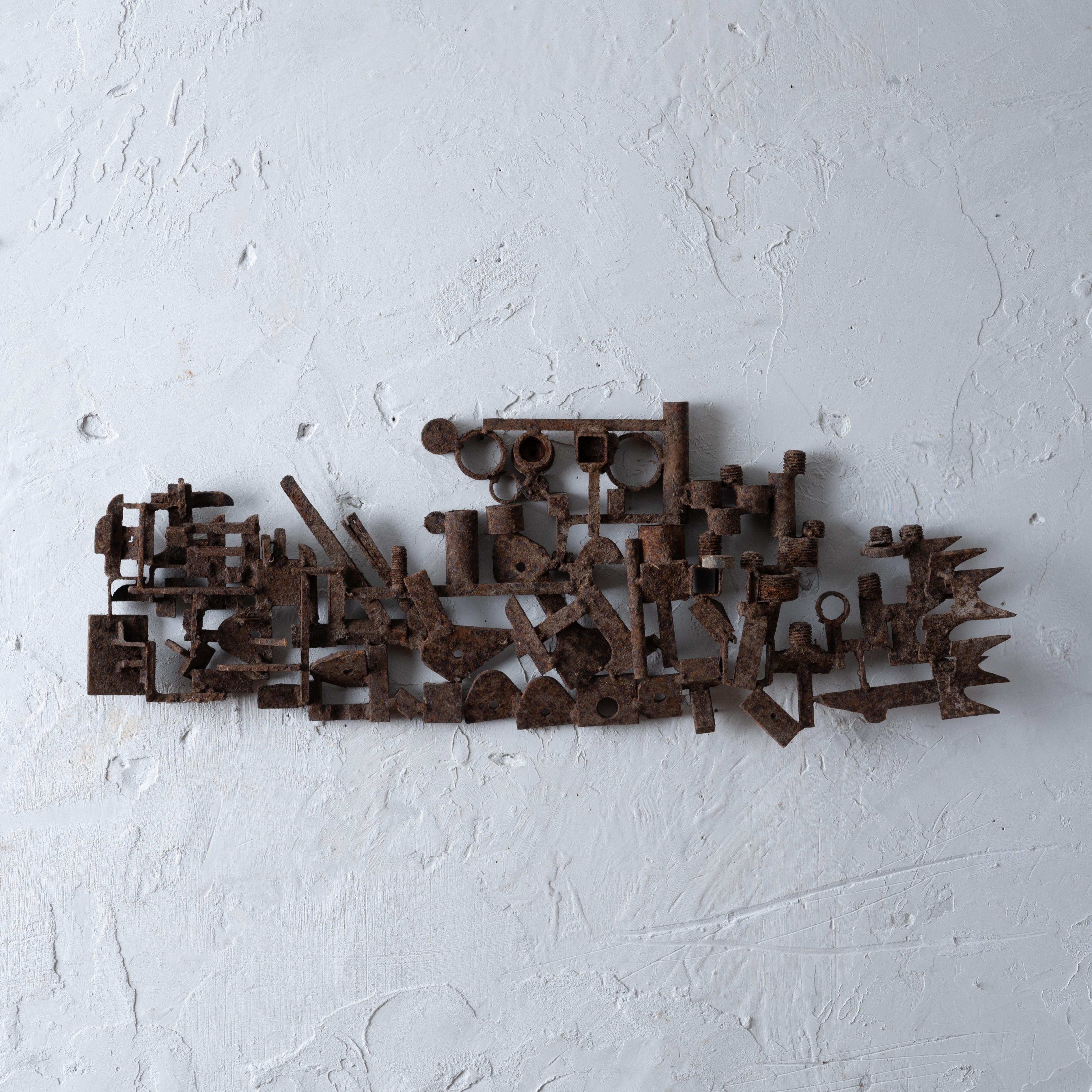 Giovanni 'John' Bucci
(Italian-American, 1935-2019)

A welded metal sculpture composed of various found metal pieces, 1960s.

30 inches wide by 11 ½ inches tall by 3 ¼ inches deep



