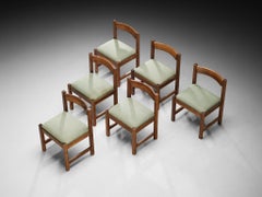 Giovanni Michelucci pour Poltronova : six chaises de salle à manger en noyer et tissu vert