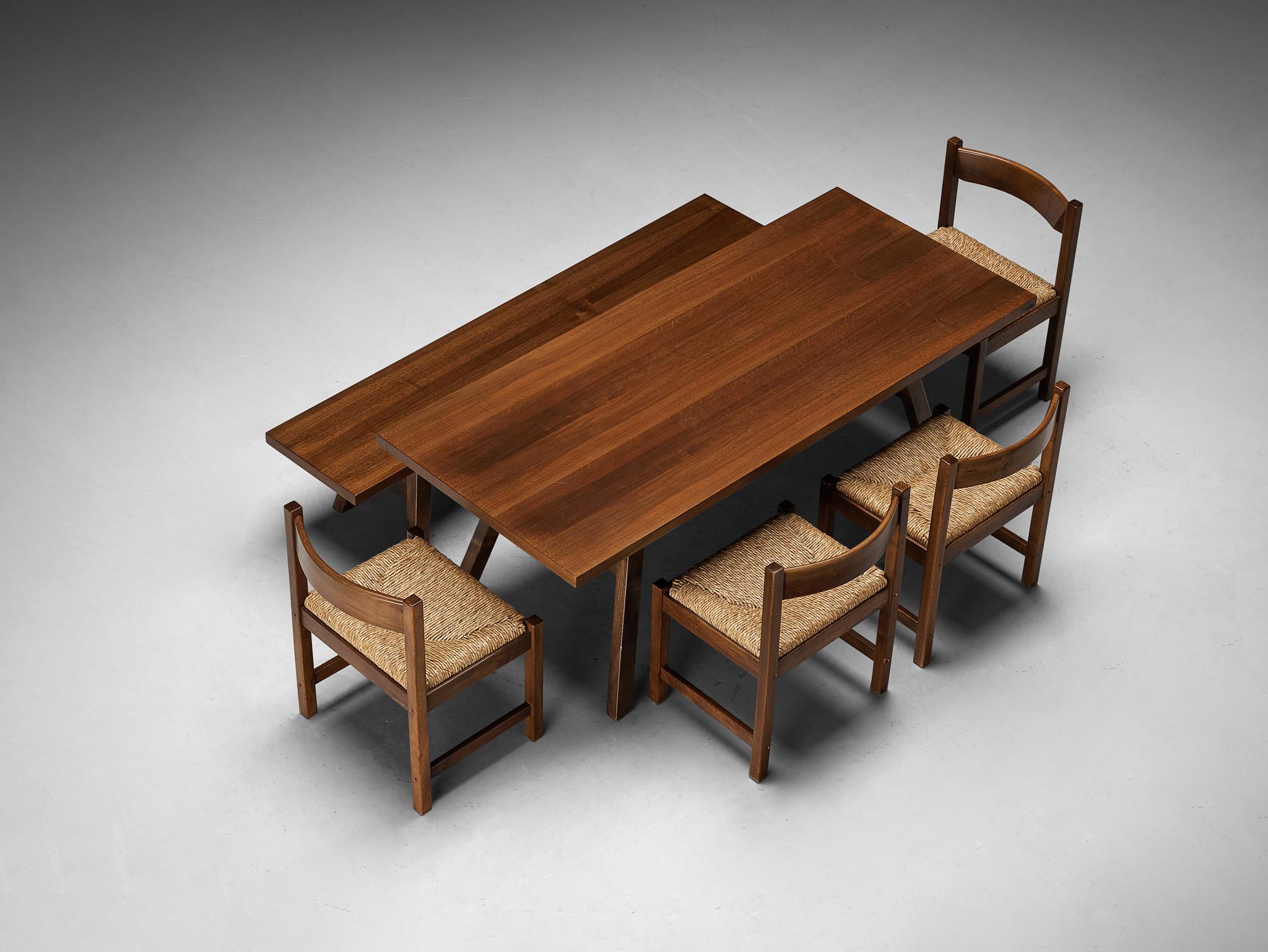 Giovanni Michelucci for Poltronova, ´Torbecchia´ dining room set; table, bench and four chairs, walnut, cane, Italy, circa 1964.

This dining room set contains one table, a bench and, four chairs. This set, with its solid and grand appearance, is