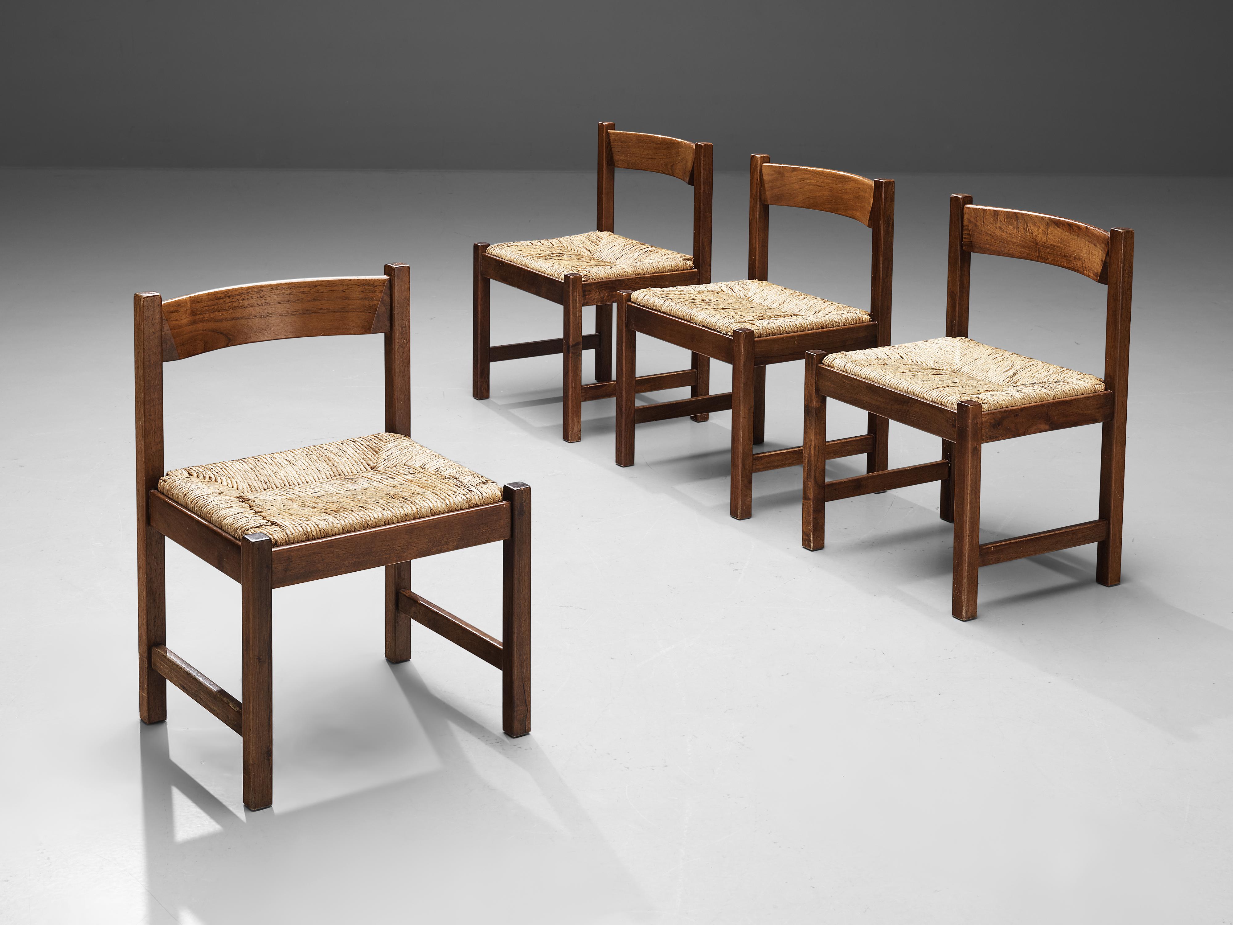 Giovanni Michelucci for Poltronova, ´Torbecchia´ dining chairs, walnut, cane, Italy, circa 1964.

This set of four dining chairs, with its solid and grand appearance, is designed by Italian designer Giovanni Michelucci (1891-1990) as part of the