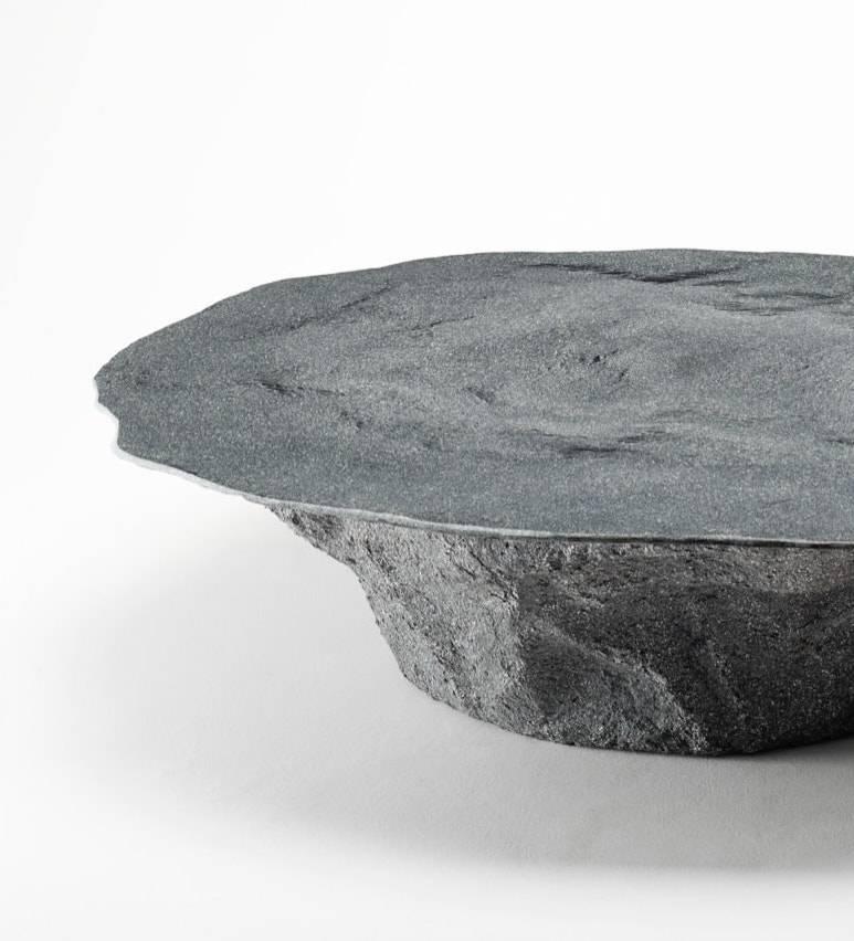 Coffee table made of Glebanite (fiberglass) and black pigment. Handmade single piece. The base is made thanks to a sand mold that is lost after its realization.
Designed and produced by Giovanni Minelli.

Biography
Giovanni Minelli was born in