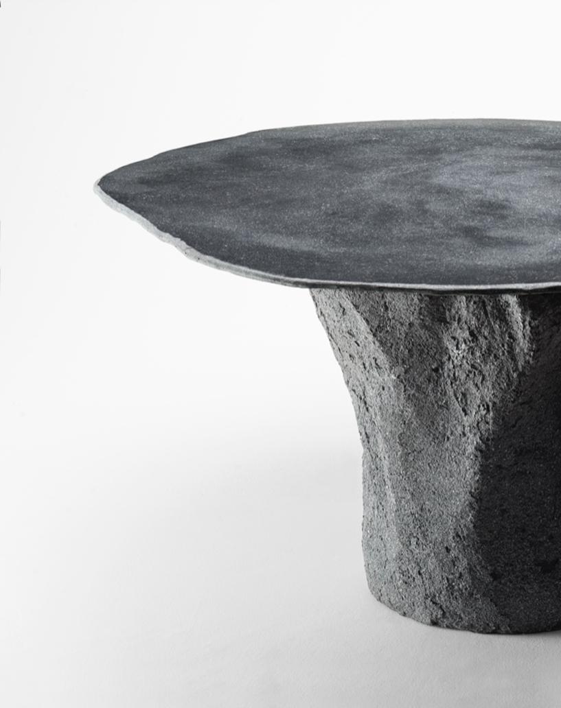 Beautiful table made of Glebanite (fiberglass) and black pigment. Handmade single piece. The base is made thanks to a sand mold that is lost after its realization.
Designed and produced by Giovanni Minelli.

Biography
Giovanni Minelli was born