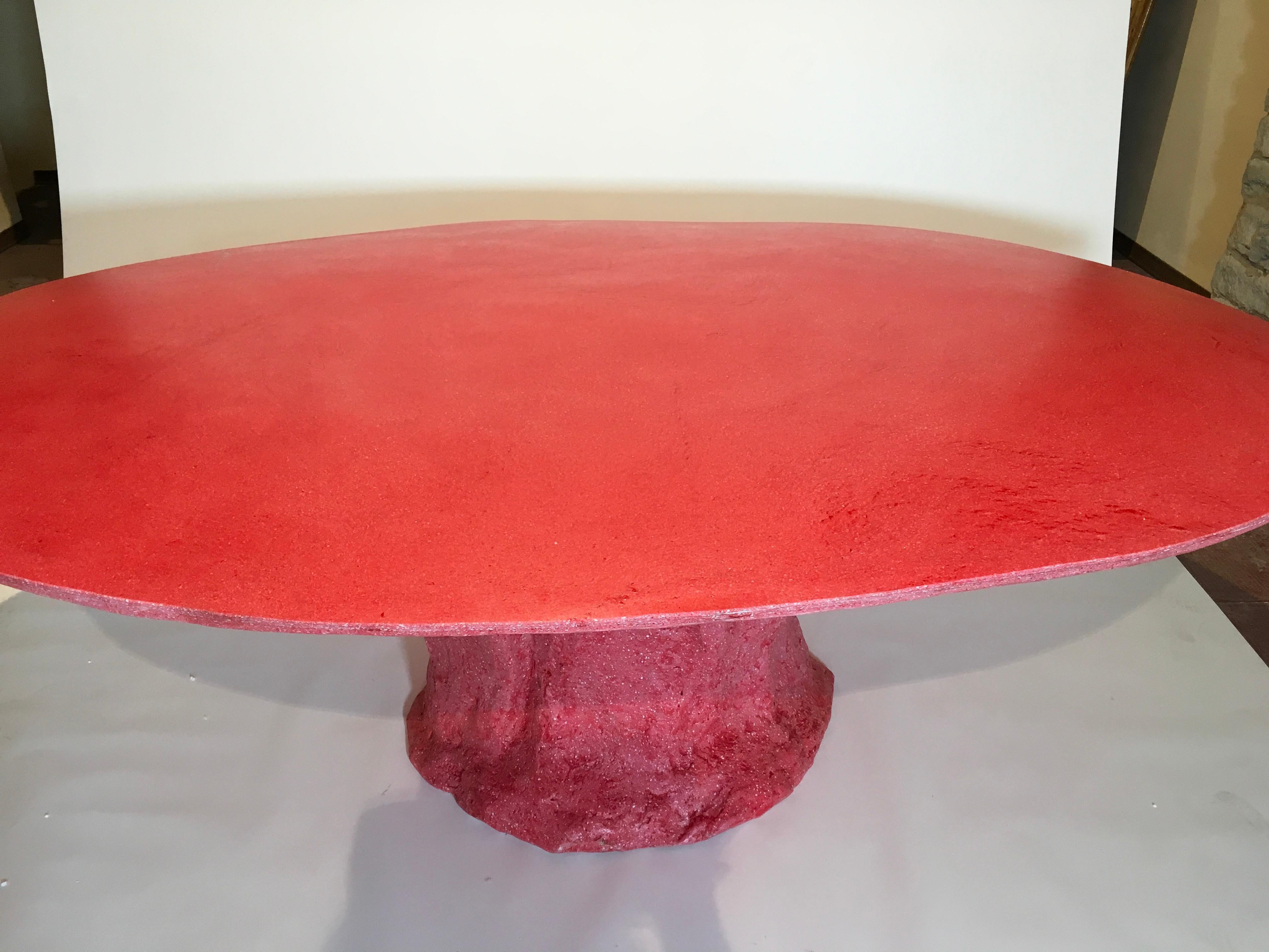 Beautiful table made of Glebanite (fiberglass) and red pigment. Handmade single piece. The base is made thanks to a sand mold that is lost after its realization.
Designed and produced by Giovanni Minelli.

Biography:
Giovanni Minelli was born in
