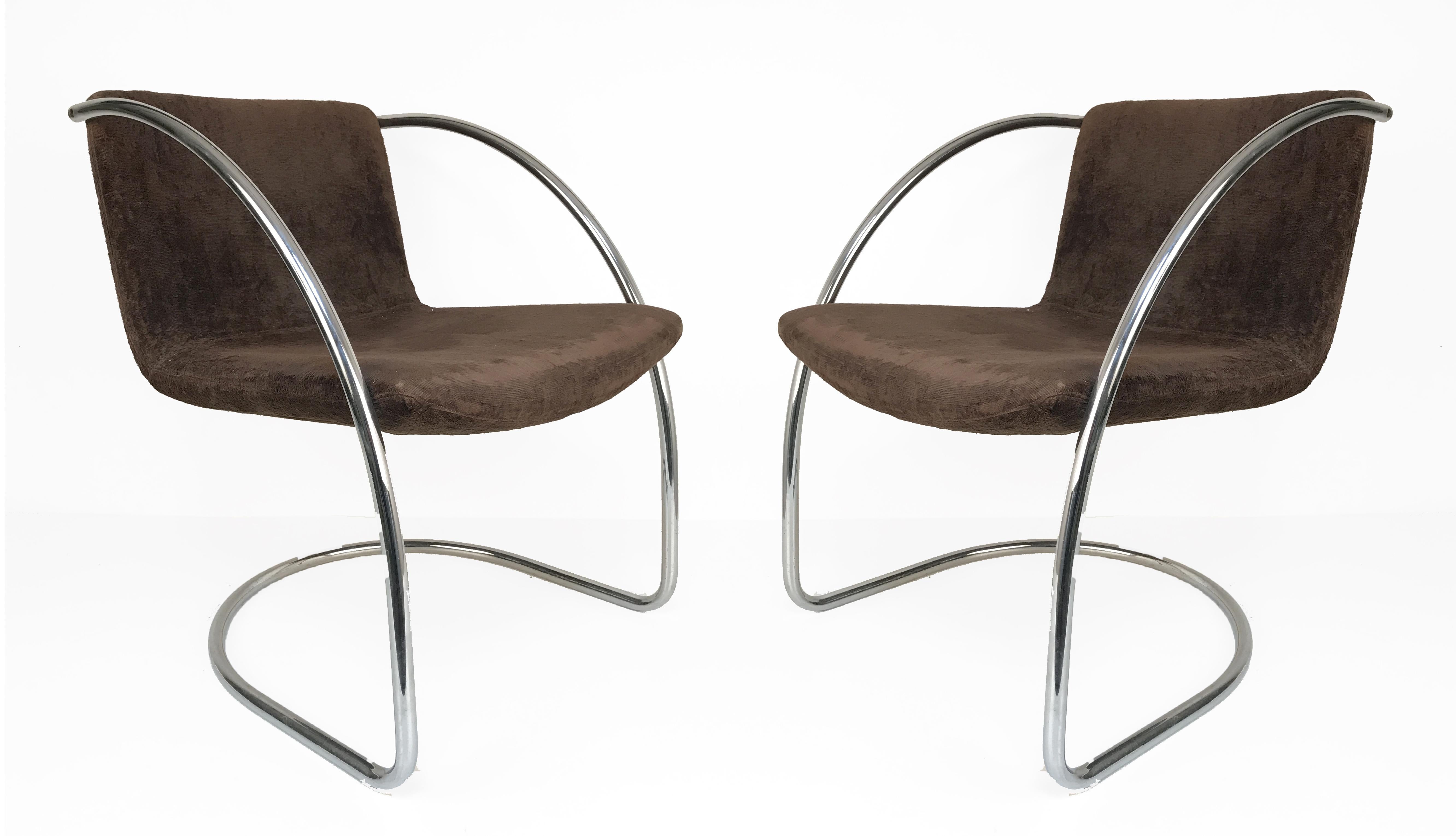 Wonderful midcentury armchairs with tubular steel structure and seats. The 