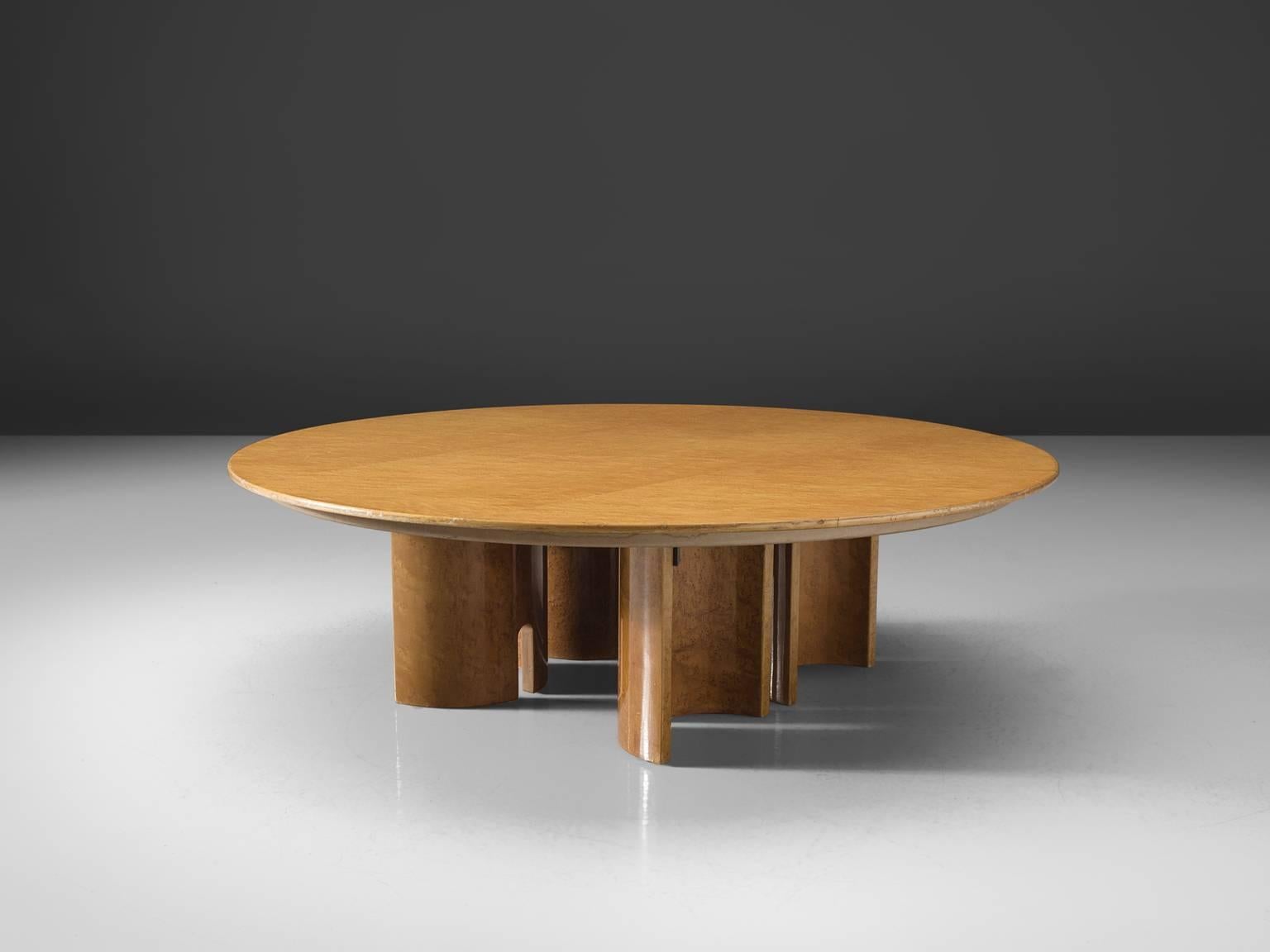 Giovanni Offredi for Saporiti, cocktail table, burl maple veneer, Italy, 1980s.

This sculptural table features semi-circular open legs, four in all. These sculptural legs support a thick round top. The table has a very architectural feel to it in