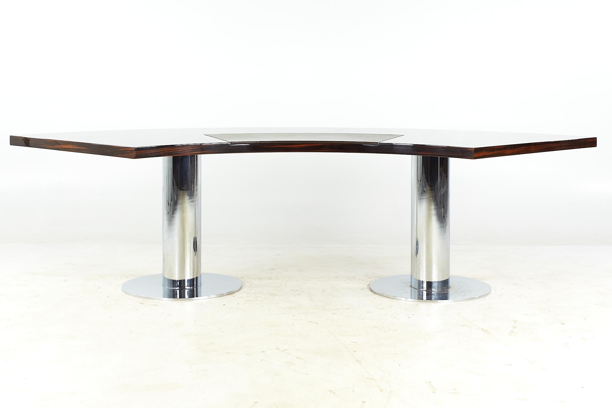 Giovanni Offredi for Saporiti Mid Century Italian Rosewood Chrome and Leather Desk

This desk measures: 114.25 wide x 39.5 deep x 29.75 high, with a chair clearance of 27.75 inches

All pieces of furniture can be had in what we call restored