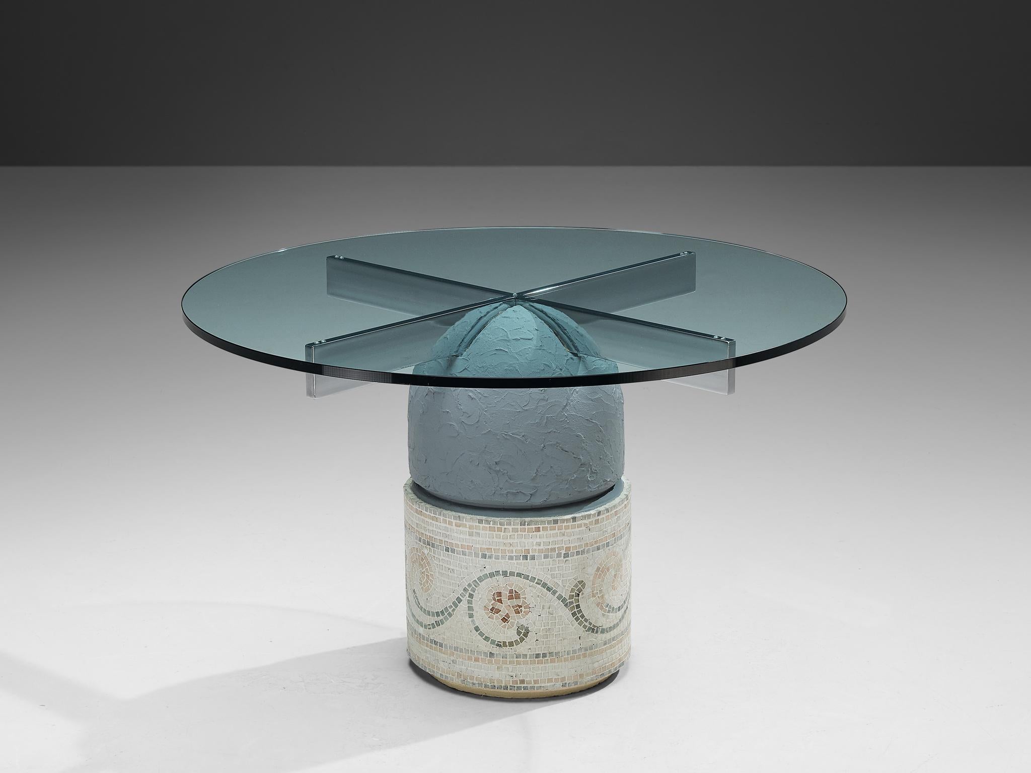 Giovanni Offredi for Saporiti, 'Paracarro' dining table, glass, concrete, chrome-plated steel, mosaic, Italy, 1970

This sculptural dining table is designed by Giovanni Offredi for Saporiti in the seventies. This version of the Paracarro design