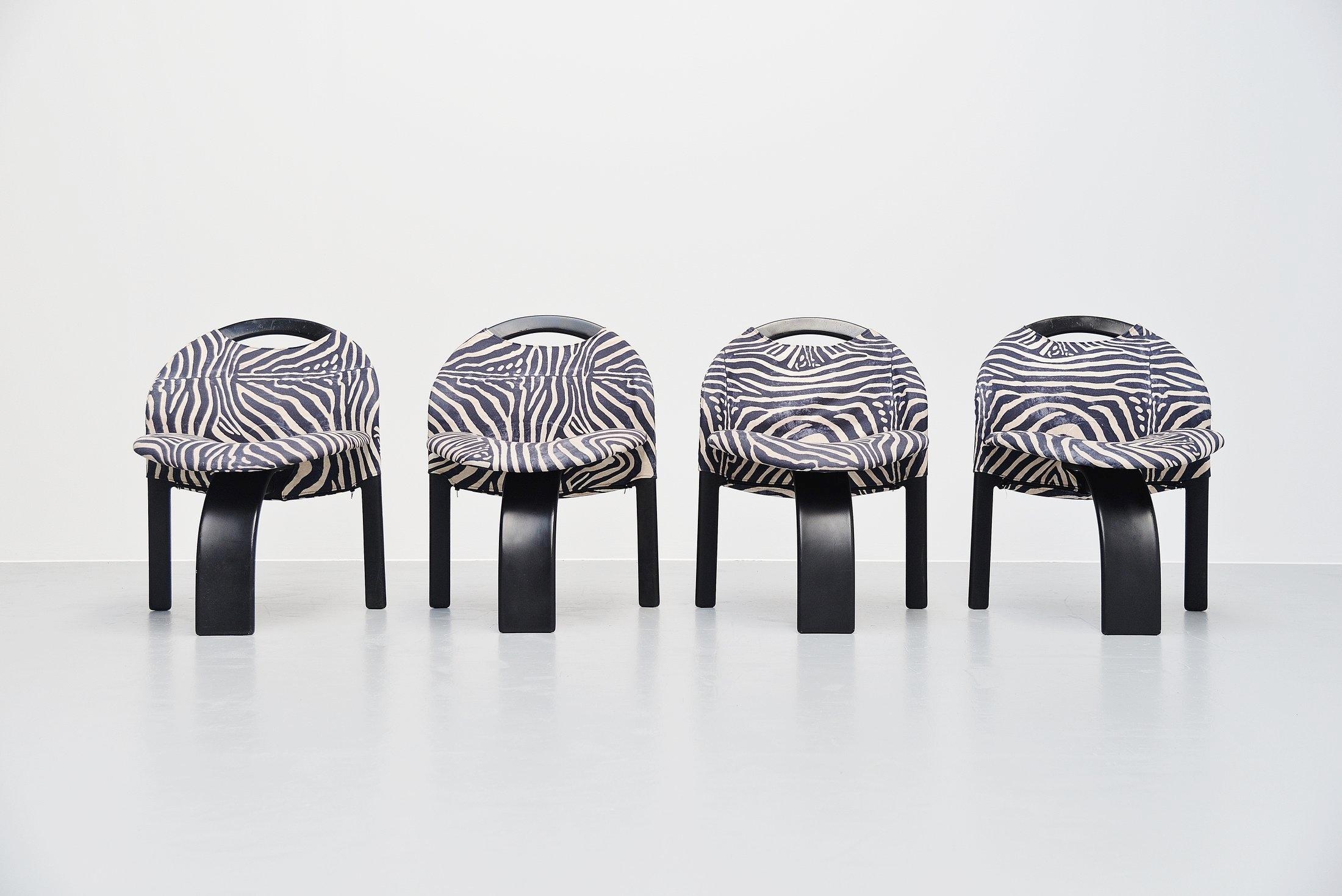 Very nice set of 'Sail' chairs designed by Giovanni Offredi and manufactured by Saporiti, Italy 1973. The chairs are made of black plastic and these 4 chairs have a nice and unusual zebra print fabric. These extraordinary chairs seat very