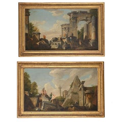 A pair of 18th century Italian landscapes with classical ruins and figures