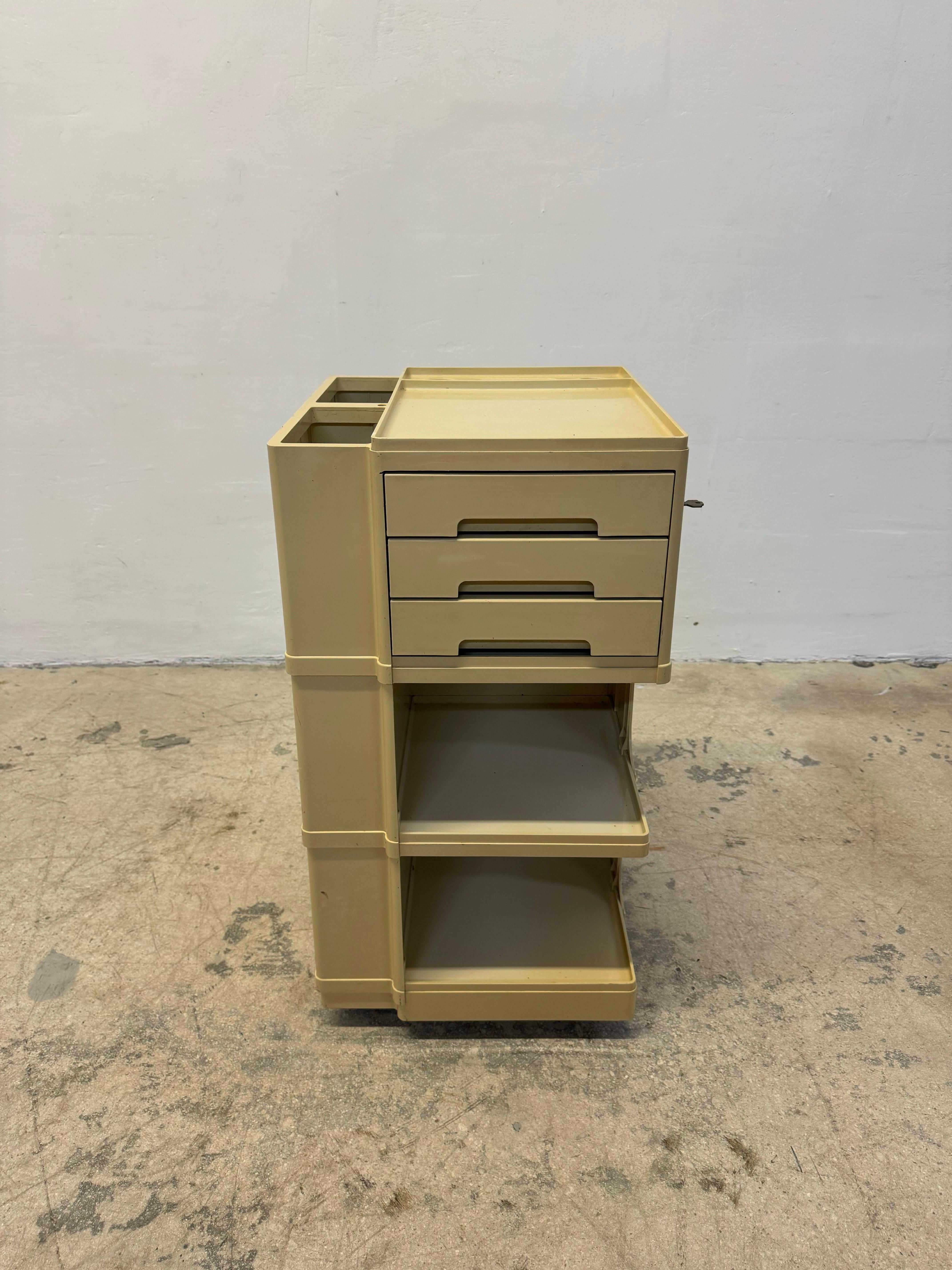Plastic artist’s trolley on casters from the 1960s designed by Giovanni Pelis for Stile Neolt.  The key locks the top drawer only.