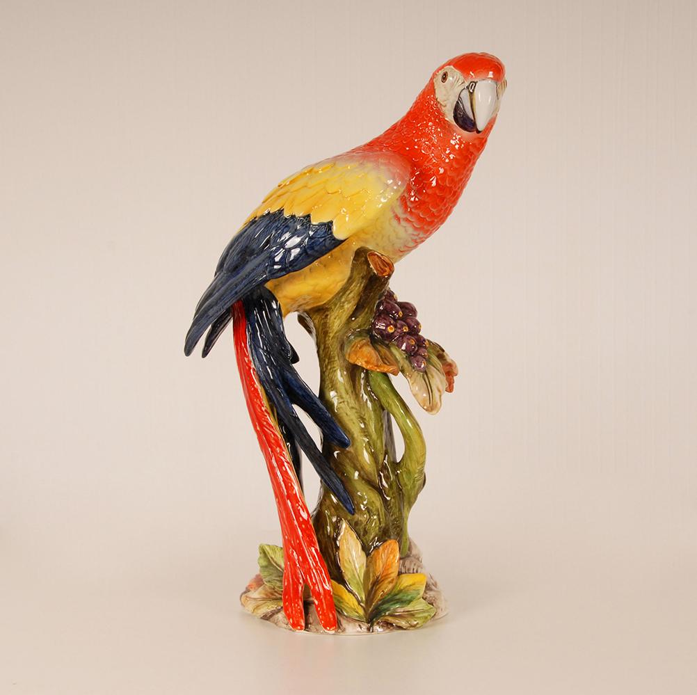 Giovanni Ronzan tall ceramic animal figure - sculpture.
Depicting a Parrot on a tree trunk.
Hand crafted and hand painted in strong lively colors.
Style: Baroque, Mid century, Hollywood Regence Italian design.
Made by Giovanni Ronzan signed