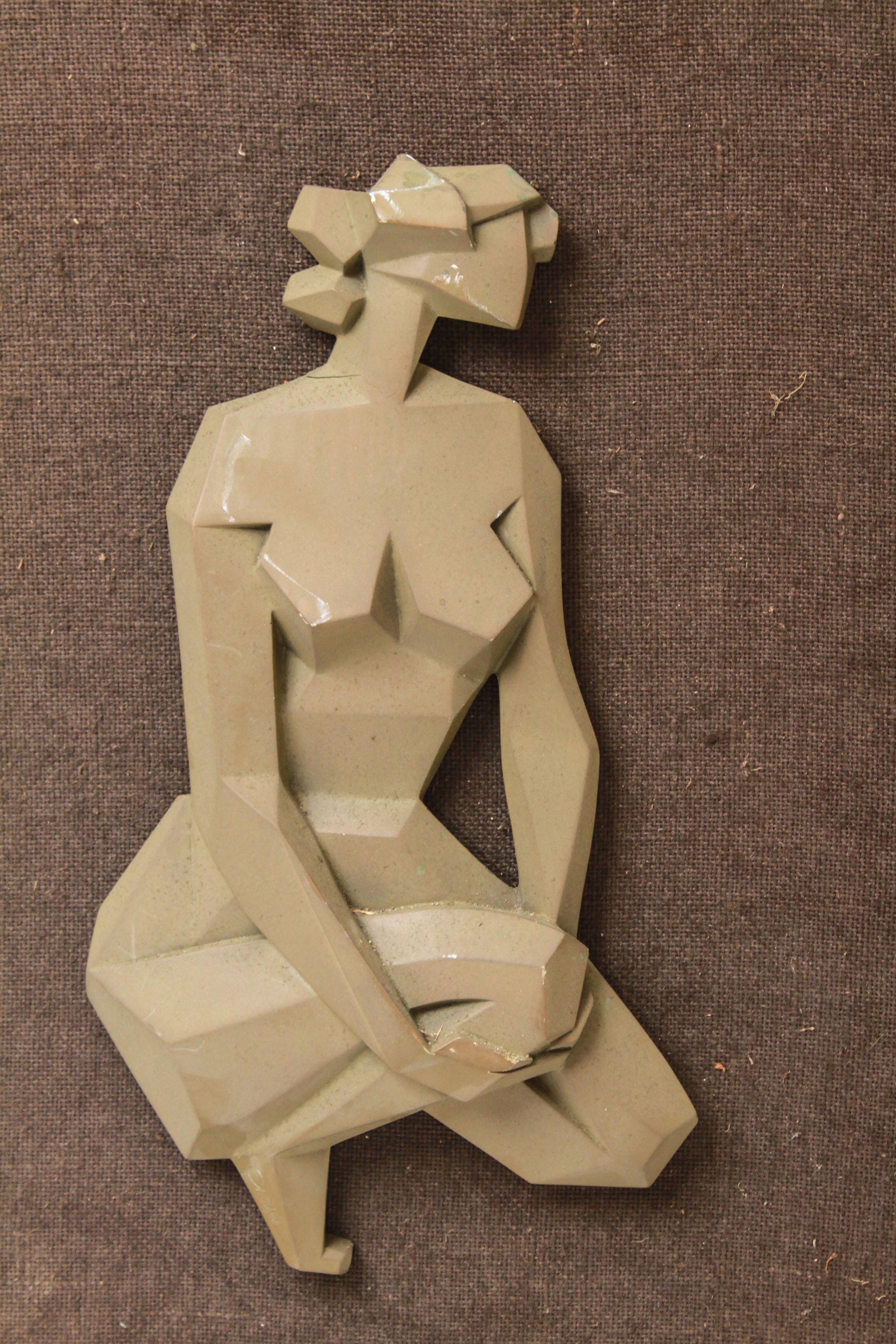 Mid-Century Modern framed metal wall sculpture of a female nude figure in bas-relief, created by Giovanni Schoeman (South African, 1940-1980). The piece is signed 