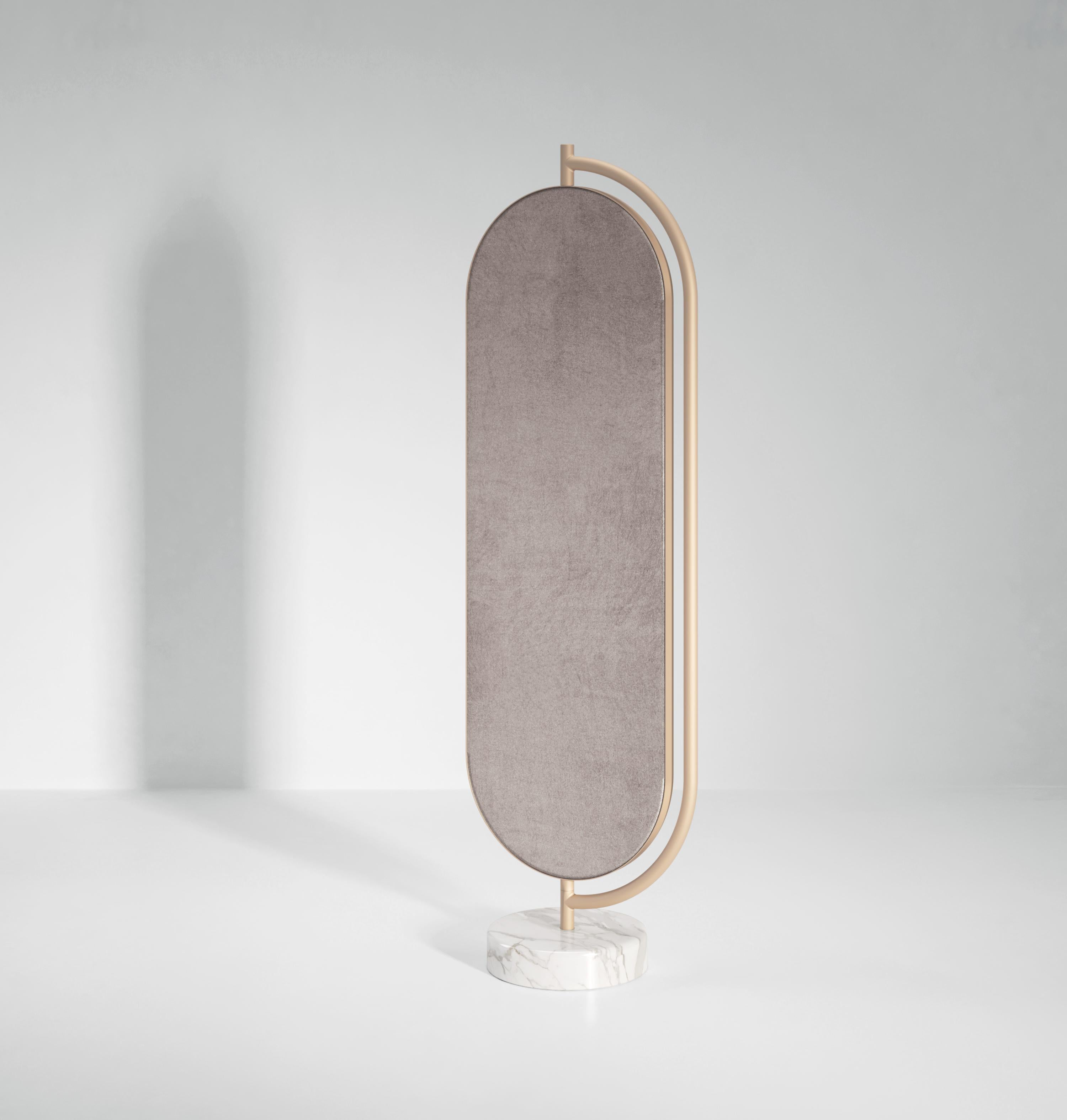 Giove is a full length mirror supported by a polished marble base with an elegant metal structure. The back of the mirror can be upholstered in a number of different fabrics. Giove can rotate inside the metal frame, offering new shapes and angles